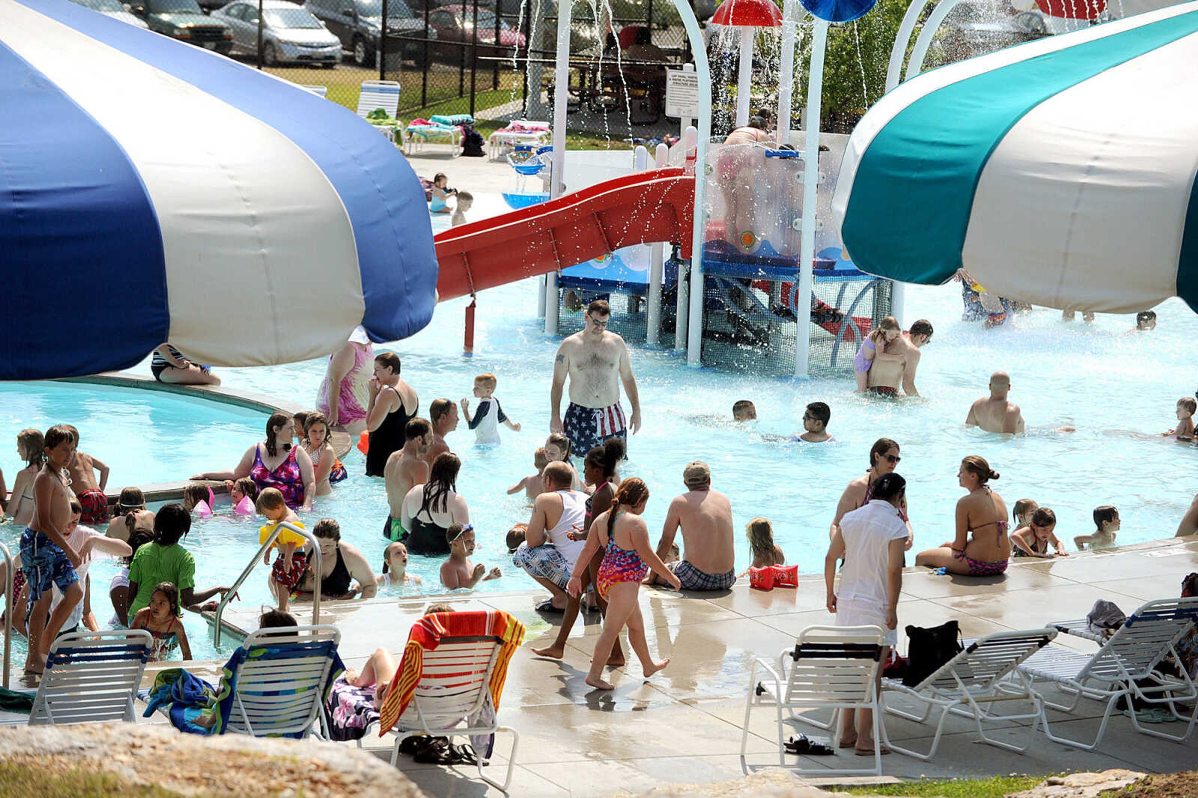 LAURA SIMON ~ lsimon@semissourian.com
People cool off in the pools and play area Sunday, May 27, 2012 at Cape Splash in Cape Girardeau. Sunday set a record high of 95 degrees. The water park's attendance Sunday was 1,120.