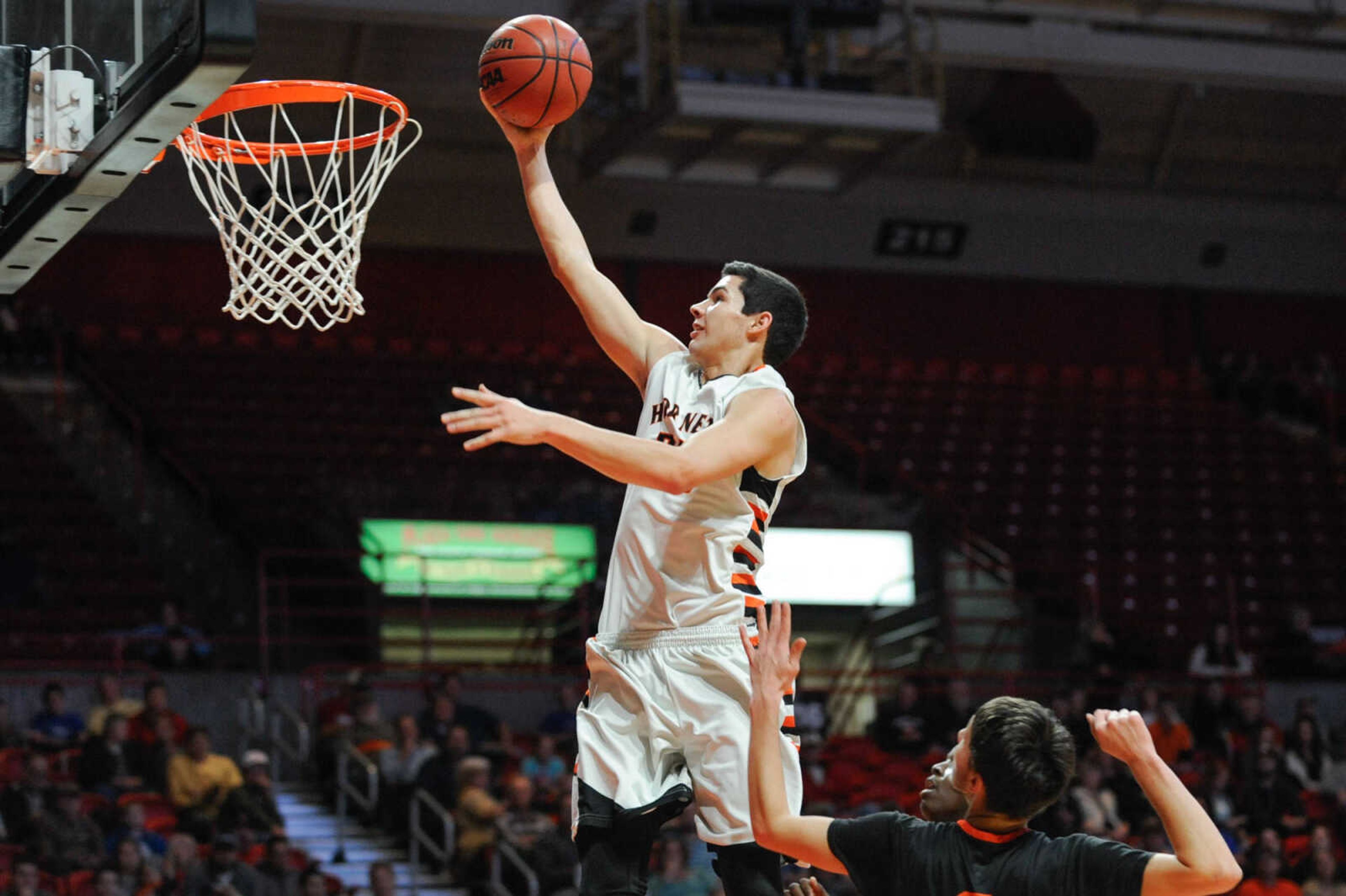 Advance's Austin Ladd takes the ball in for two points against Scott County Central during the first quarter in the fifth place game of the Southeast Missourian Christmas Tournament Wednesday, Dec. 30, 2015 at the Show Me Center. (Glenn Landberg)