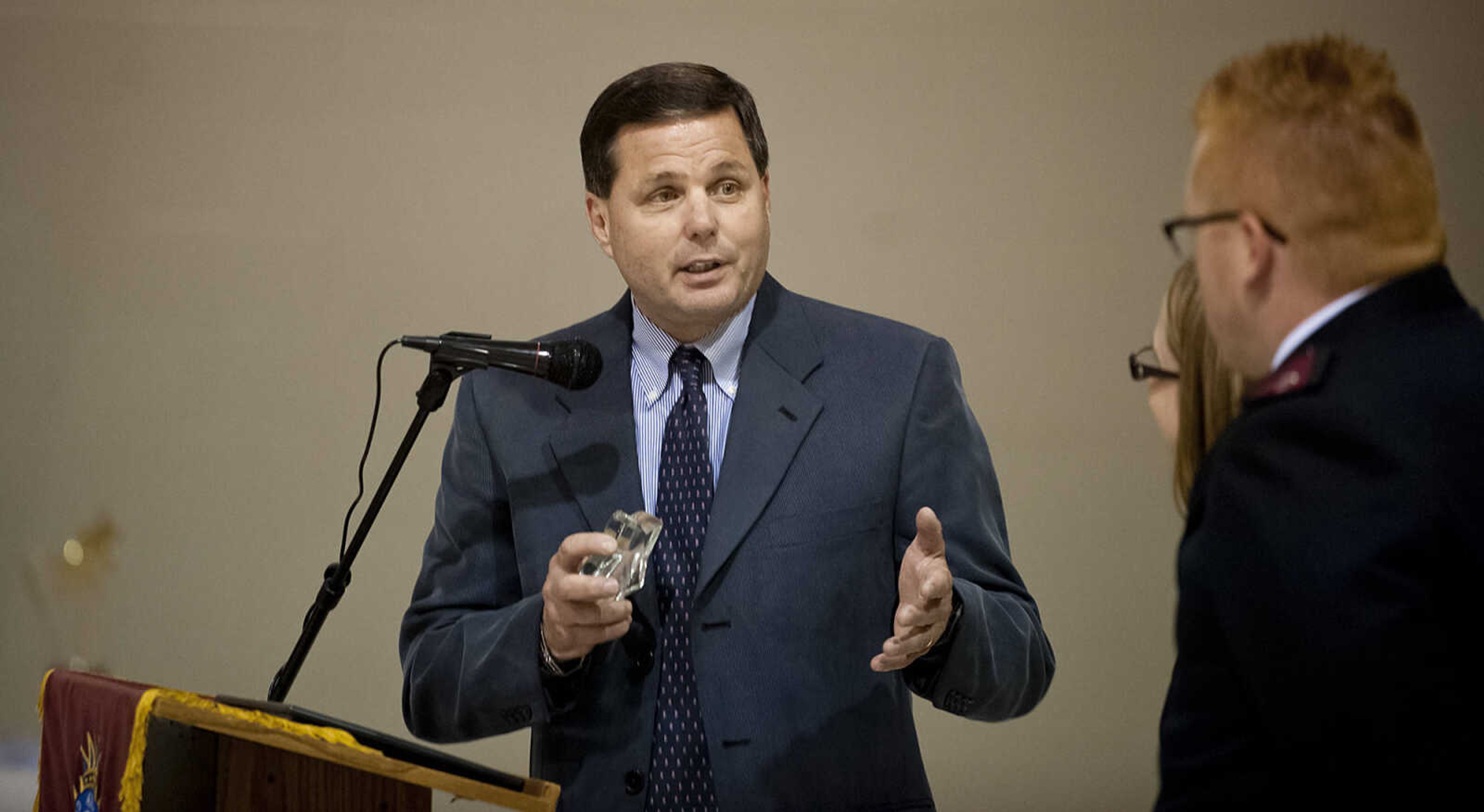 Schnucks manager Dennis Marchi speaks about Captains Ronnie and Bridgette Amick after Schnucks was named the recipient of the  Enduring Star Award during the Cape Girardeau Salvation Army's annual dinner, "A Night with the Stars," Thursday, May 8, at the Cape Girardeau Salvation Army.