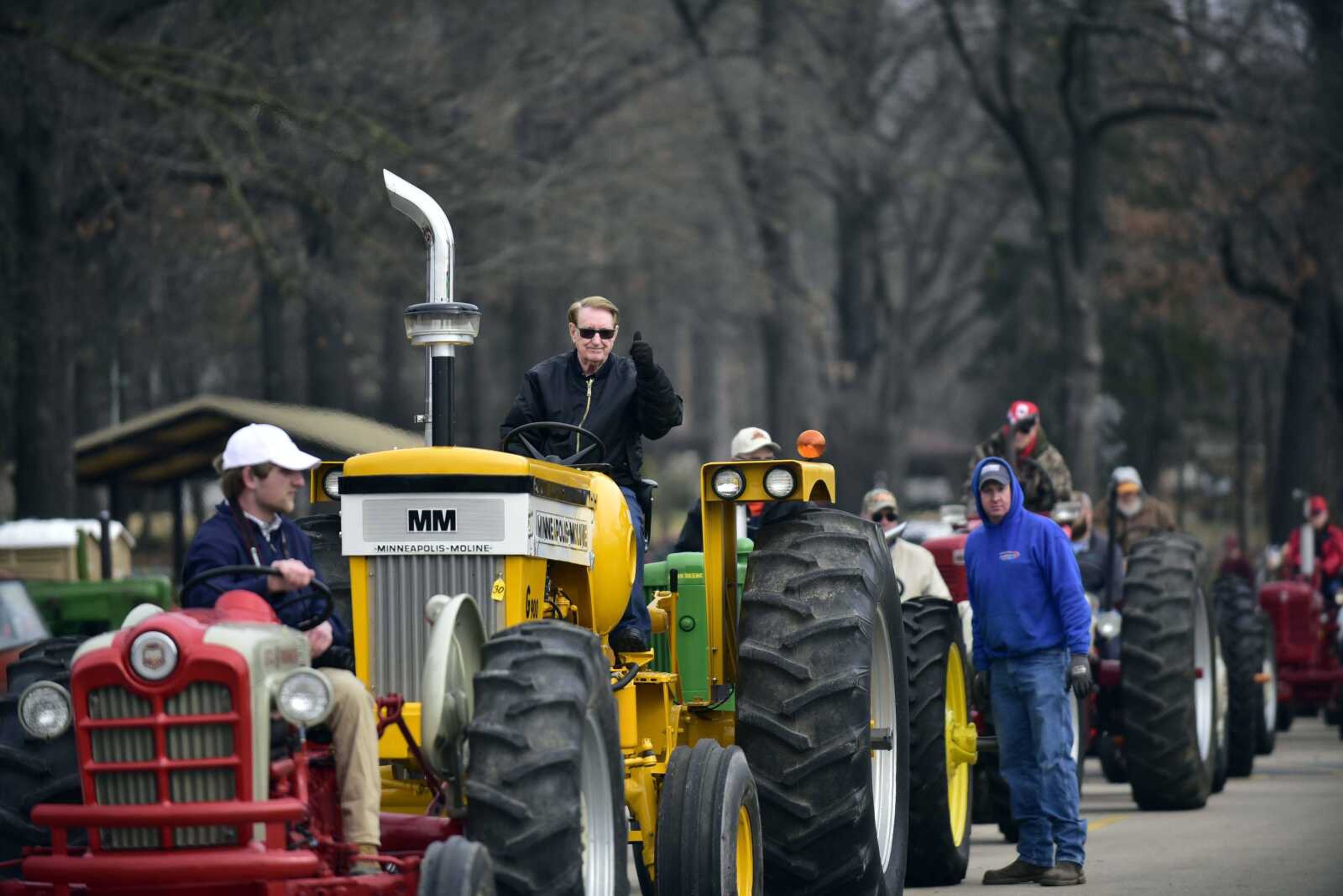 Cousin Carl gives a thumbs-up from his tractor before the start of the tractor parade at the Cousin Carl Farm Show on March 10, 2018, at Arena Park in Cape Girardeau. This year's show is set Saturday. See Page 3A for information.