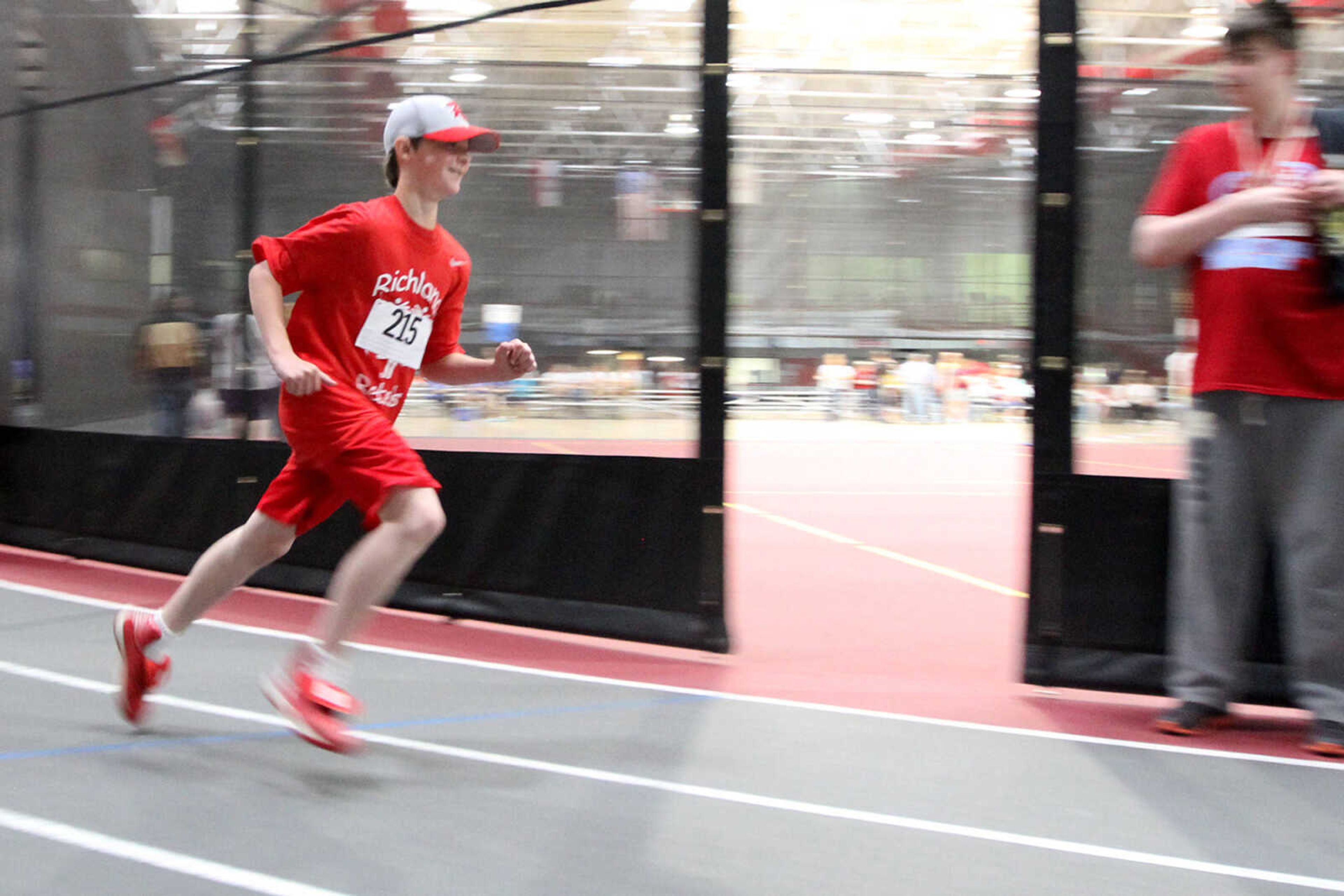 GLENN LANDBERG ~ glandberg@semissourian.com

Kyle Smith works his way around the track in the 200-meter race during the Missouri Special Olympics Southeast Area Spring Games Saturday, April 11, 2015 at the Student Recreation Center of Southeast Missouri State University.