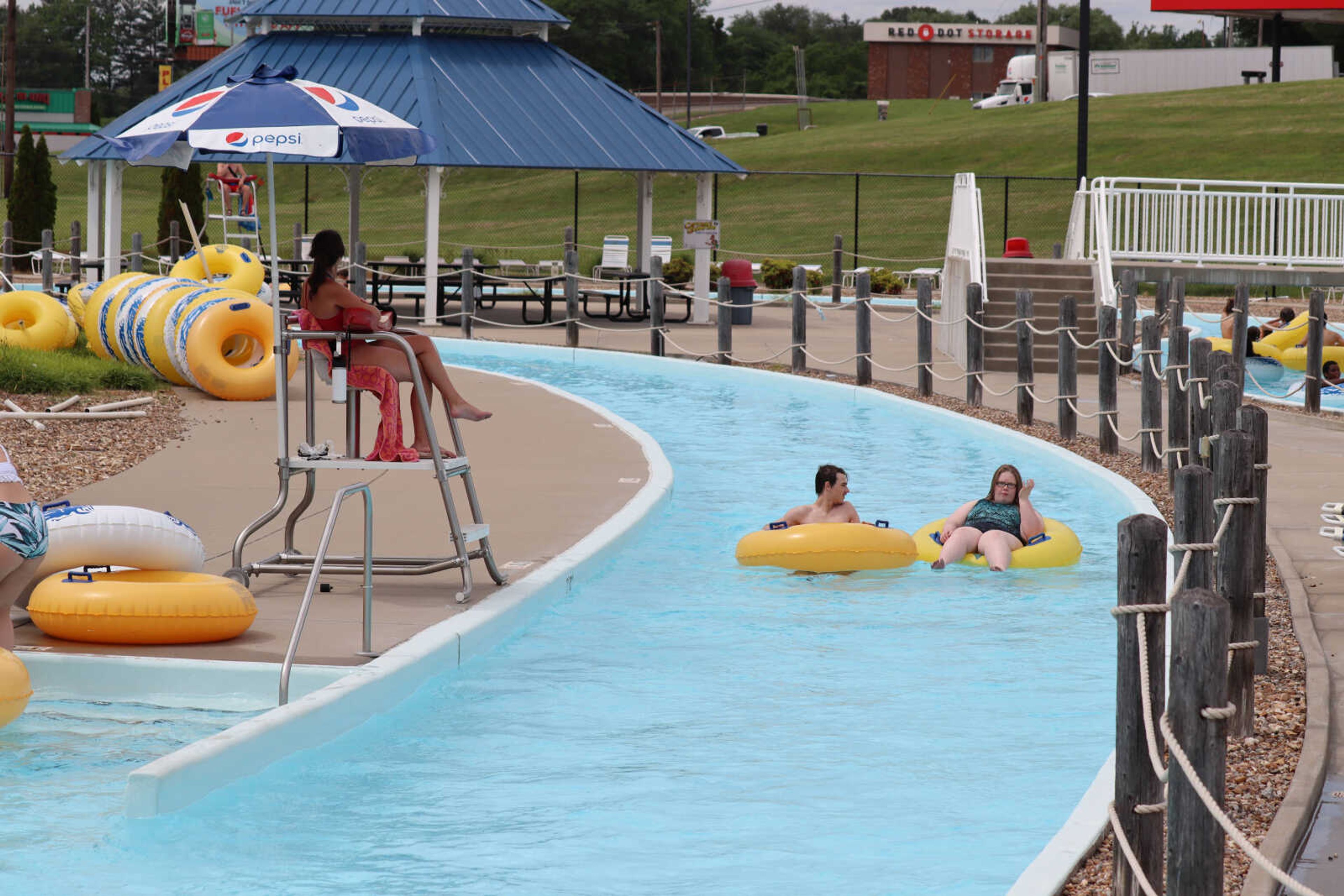 Noah Hanes and Sydney Hanes floating their way down throught the lazy river at Cape Splash on Thursday.