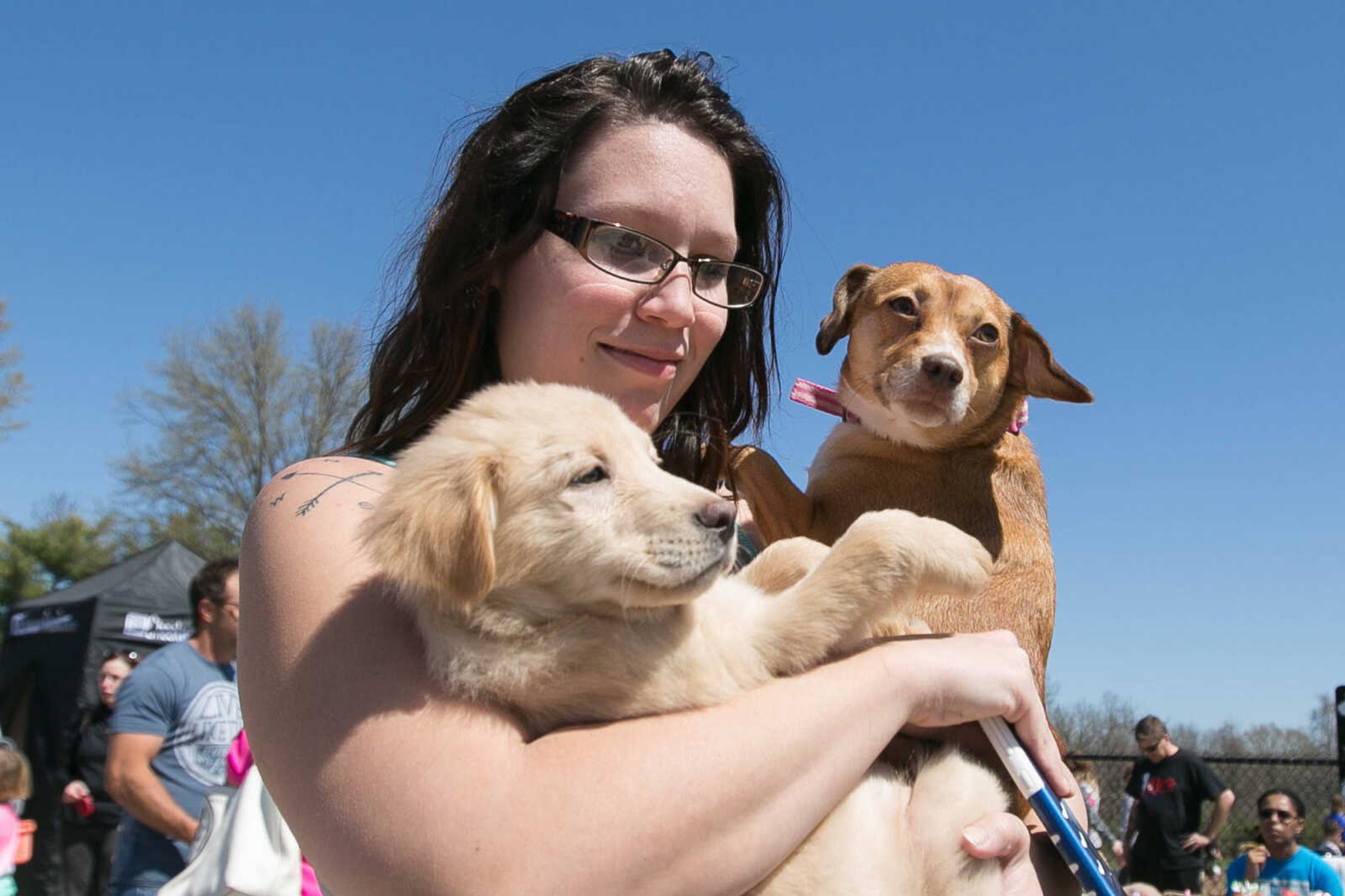 GLENN LANDBERG ~ glandberg@semissourian.com

Dogs and their owners take to Dog Town in Kiwanis Park, Saturday, March 26, 2016 for the Peeps for Paws dog Easter egg hunt.