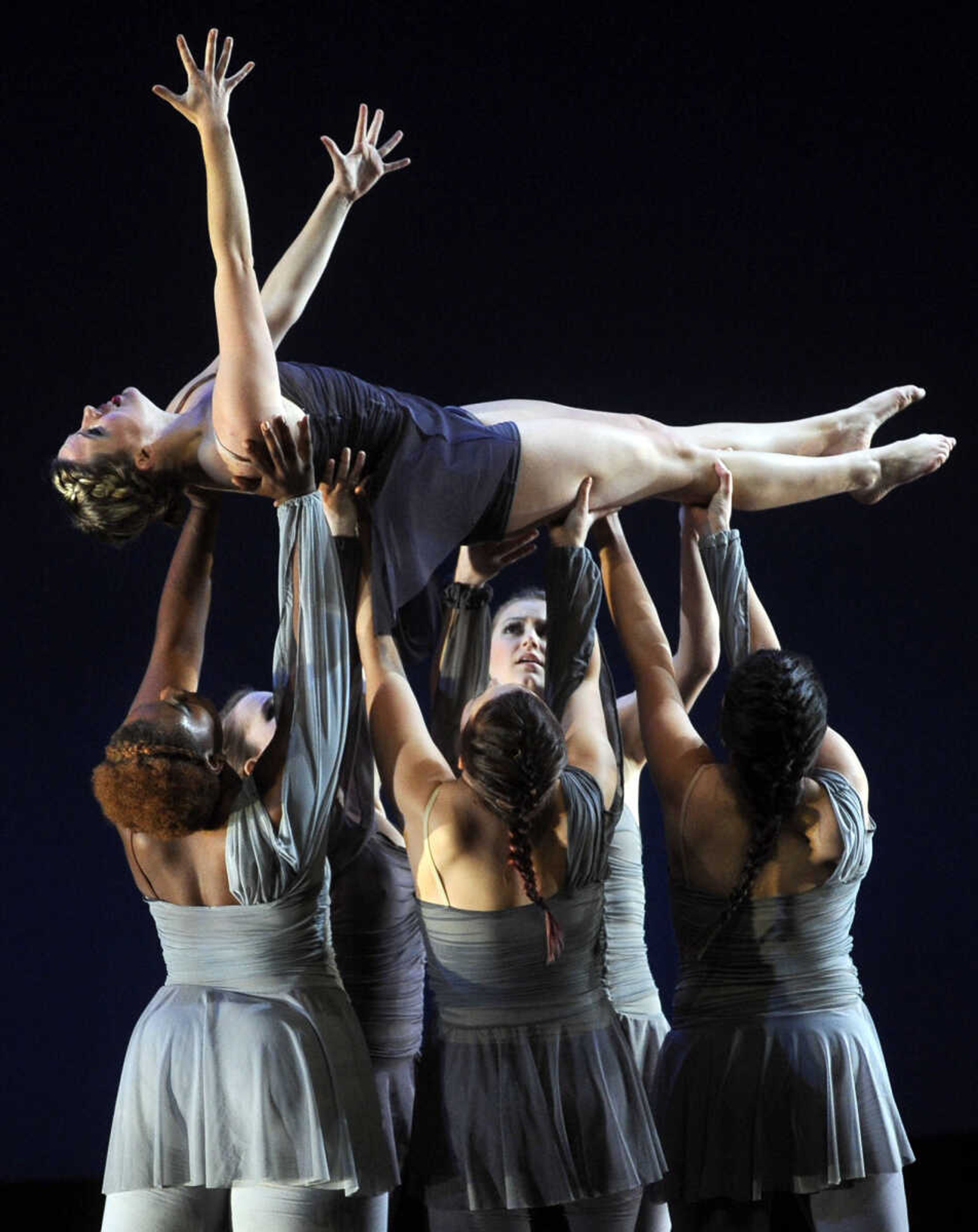 FRED LYNCH ~ flynch@semissourian.com
Southeast Missouri State University student dancers lift up Sam Fink as they perform "For Granted" during Fall for Dance 2013 on Thursday, Nov. 21, 2013 in Bedell Performance Hall at the River Campus. Additional shows will be today and Saturday at 7:30 p.m. The last show will be Sunday at 2 p.m.