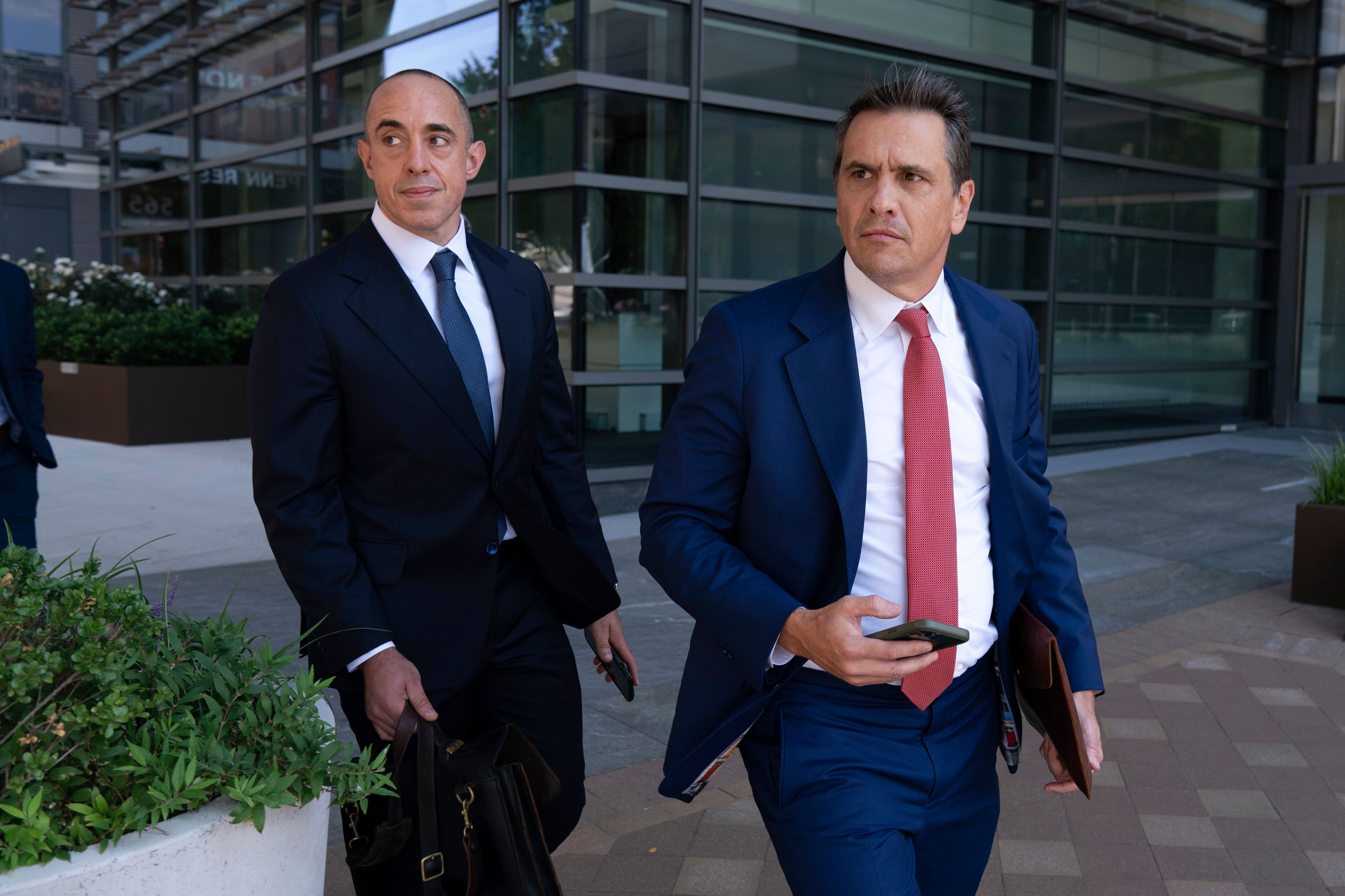 Former President Donald Trump attorneys Emil Bove, left, and Todd Blanche leave the U.S. Federal Courthouse, after a hearing, Thursday, Sep. 5, 2024, in Washington. A judge is hearing arguments about potential next steps in the federal election subversion prosecution of Donald Trump in the first hearing since the Supreme Court narrowed the case by ruling that former presidents are entitled to broad immunity from criminal charges. (AP Photo/Jose Luis Magana)