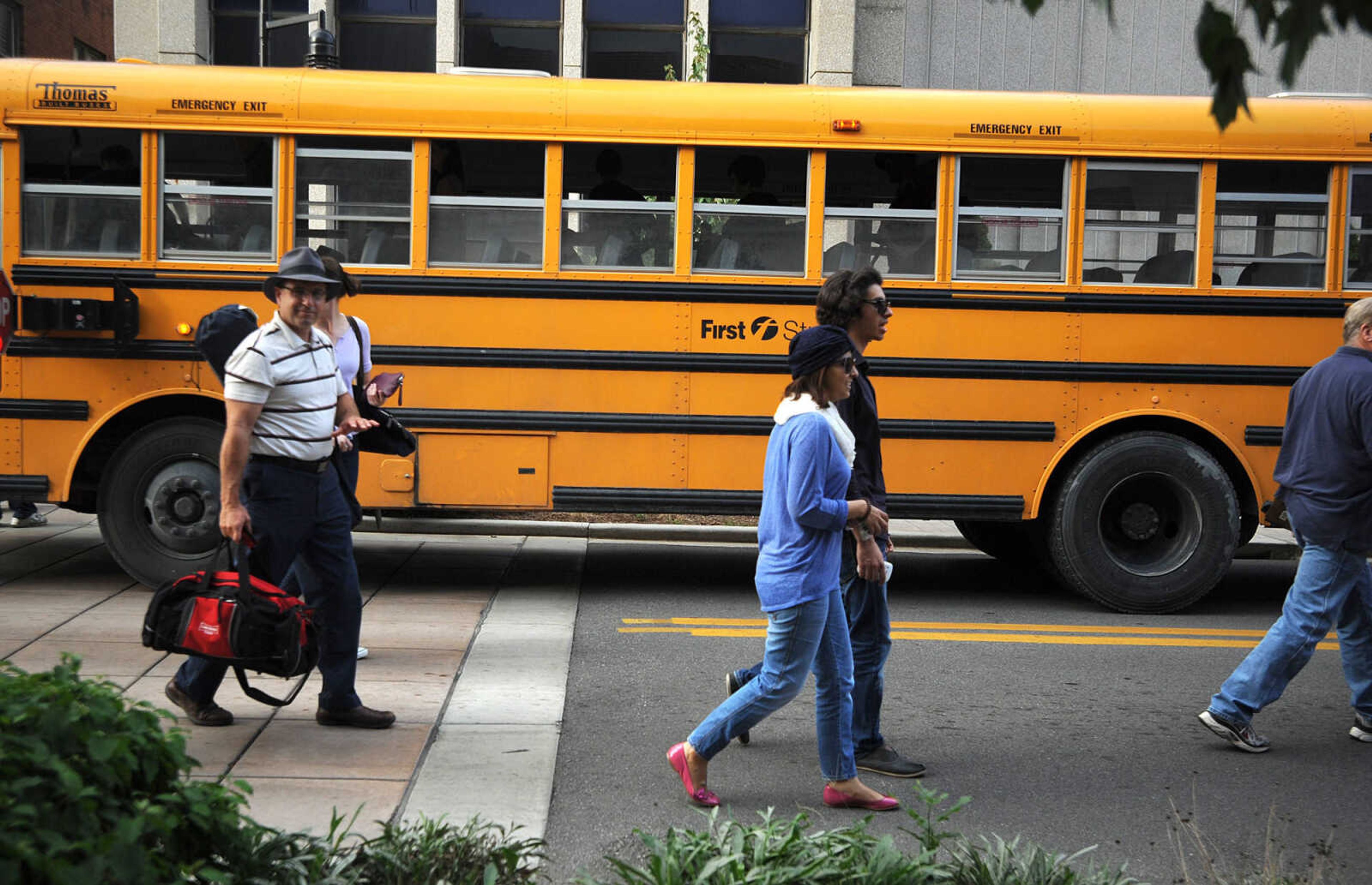 LAURA SIMON ~ lsimon@semissourian.com

Extras in 20th Century Fox's feature film "Gone Girl" arrive by bus, Thursday, Oct. 3, 2013, in Cape Girardeau.