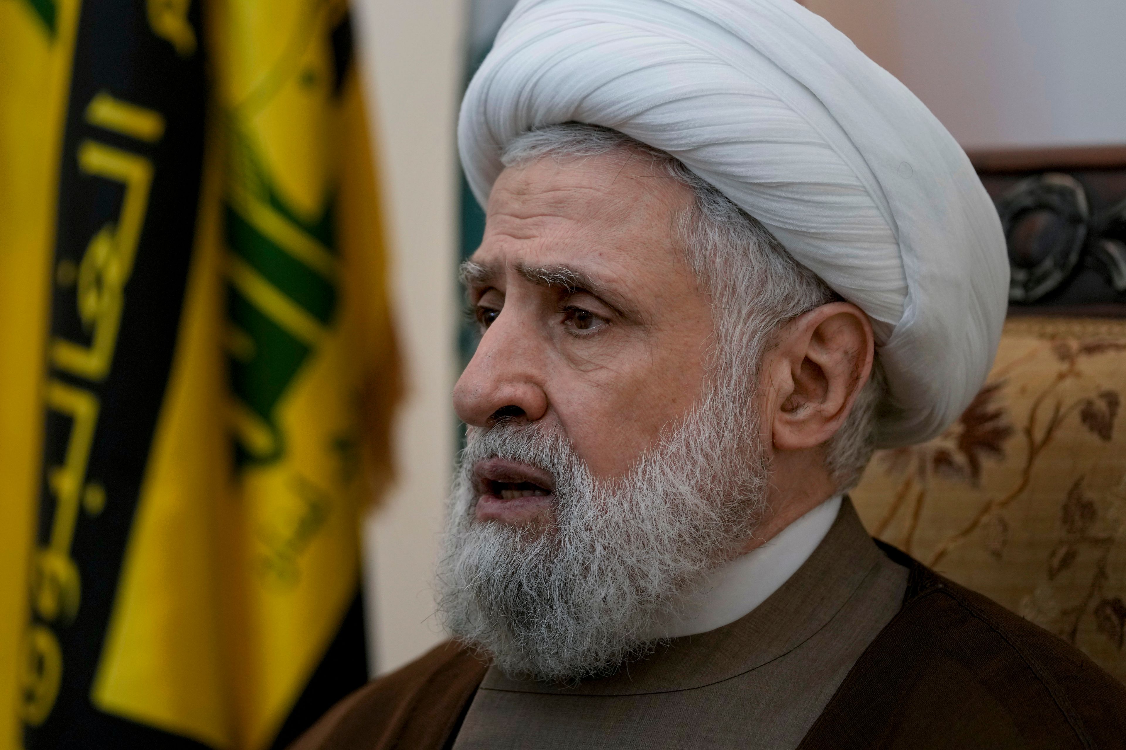 Hezbollah's deputy leader Sheik Naim Kassem, speaks during an interview with The Associated Press in Beirut's southern suburbs, Lebanon, Tuesday, July 2, 2024. (AP Photo/Bilal Hussein)