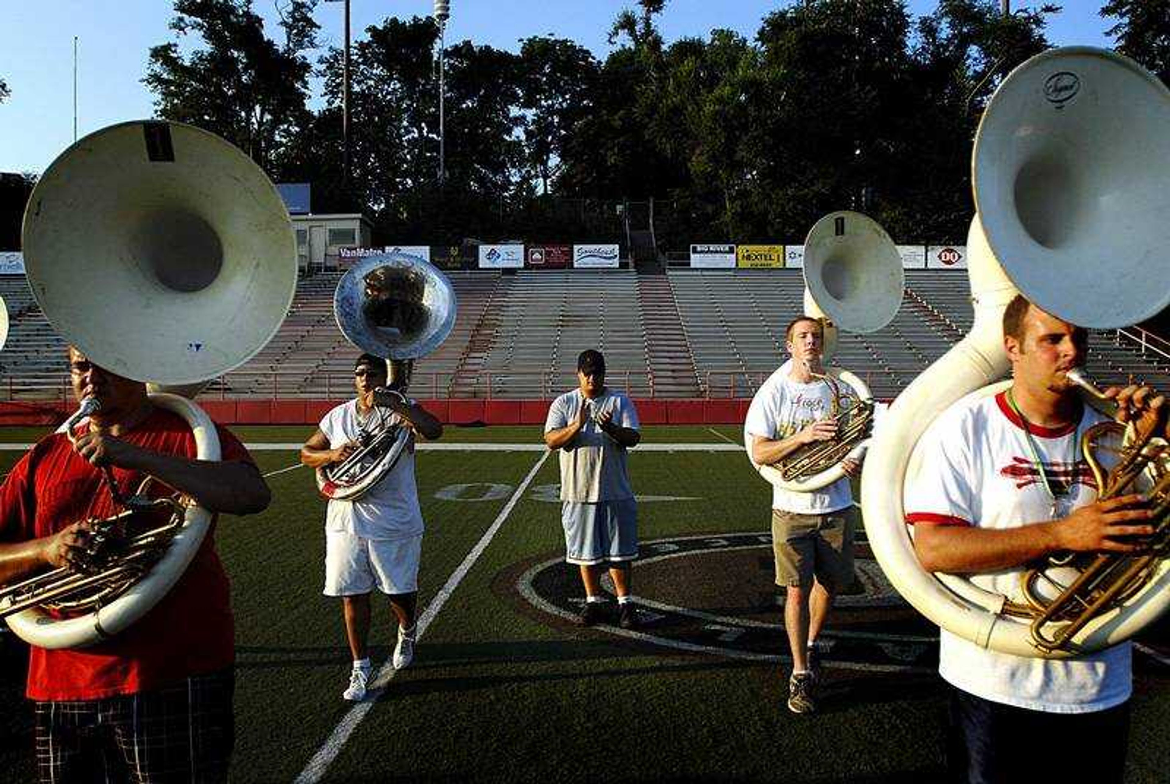 AARON EISENHAUER ~ aeisenhauer@semissourian.com
Marcus Verrett, center, the sousaphone section leader, stood behind Jason Heeter, James Wagaman, Chris Tiller and Tyler Scantlan on Thursday as he directed them in the basics of marching with their instruments.