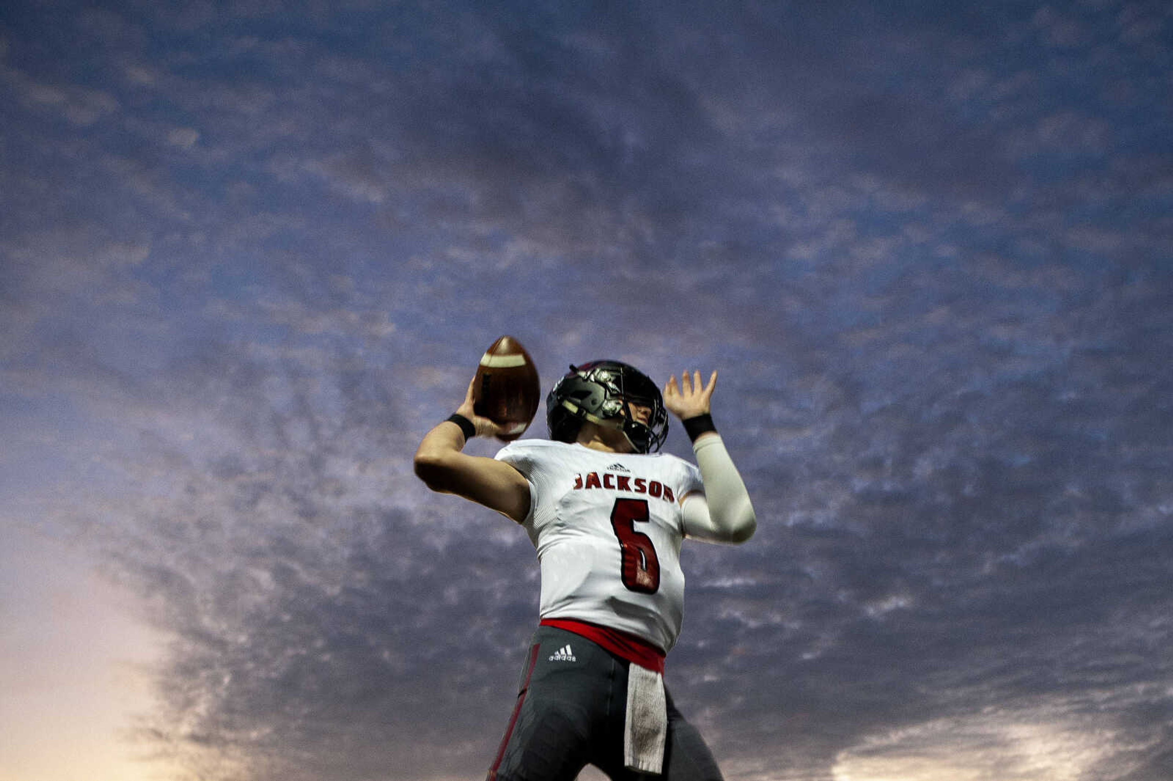 Jackson's Cael Welker (6) warms up before the start of the Jackson Indians' matchup against Farmington on Friday, Oct. 4, 2019, in Farmington, Missouri.