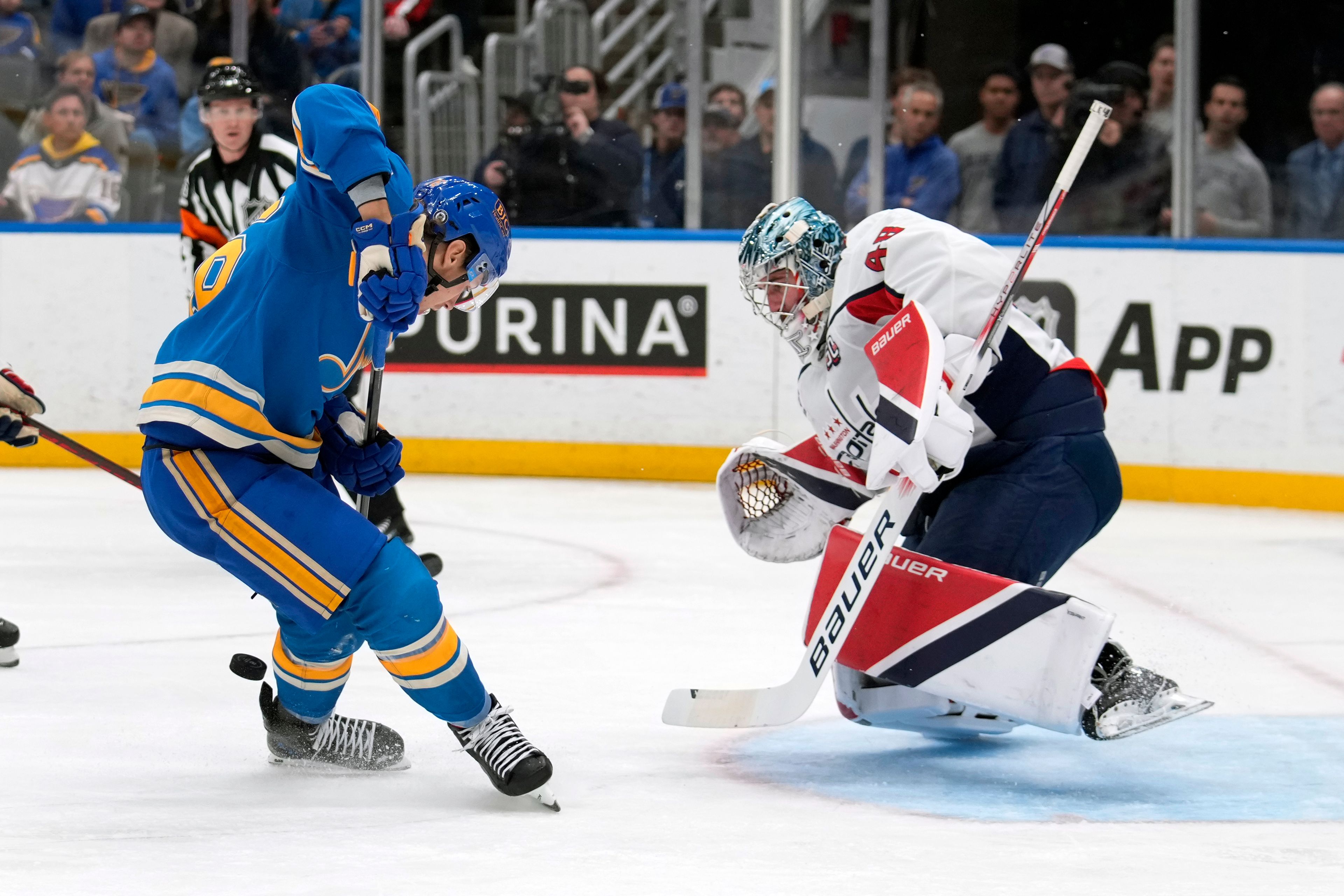 St. Louis Blues' Zack Bolduc is unable to score past Washington Capitals goaltender Logan Thompson, right, during the second period of an NHL hockey game Saturday, Nov. 9, 2024, in St. Louis. (AP Photo/Jeff Roberson)