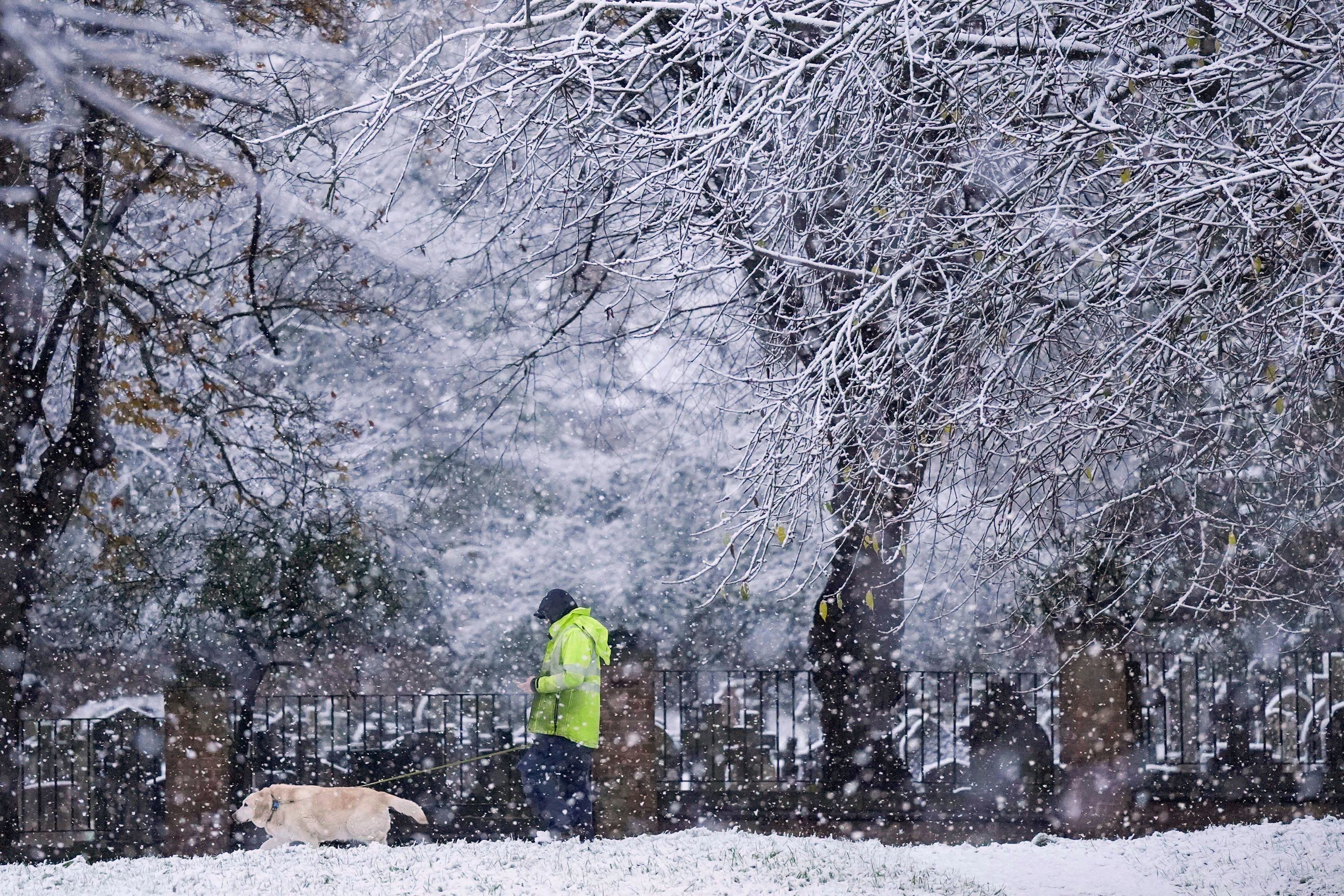 School closures and travel delays as Arctic air brings snow and sleet to parts of the UK