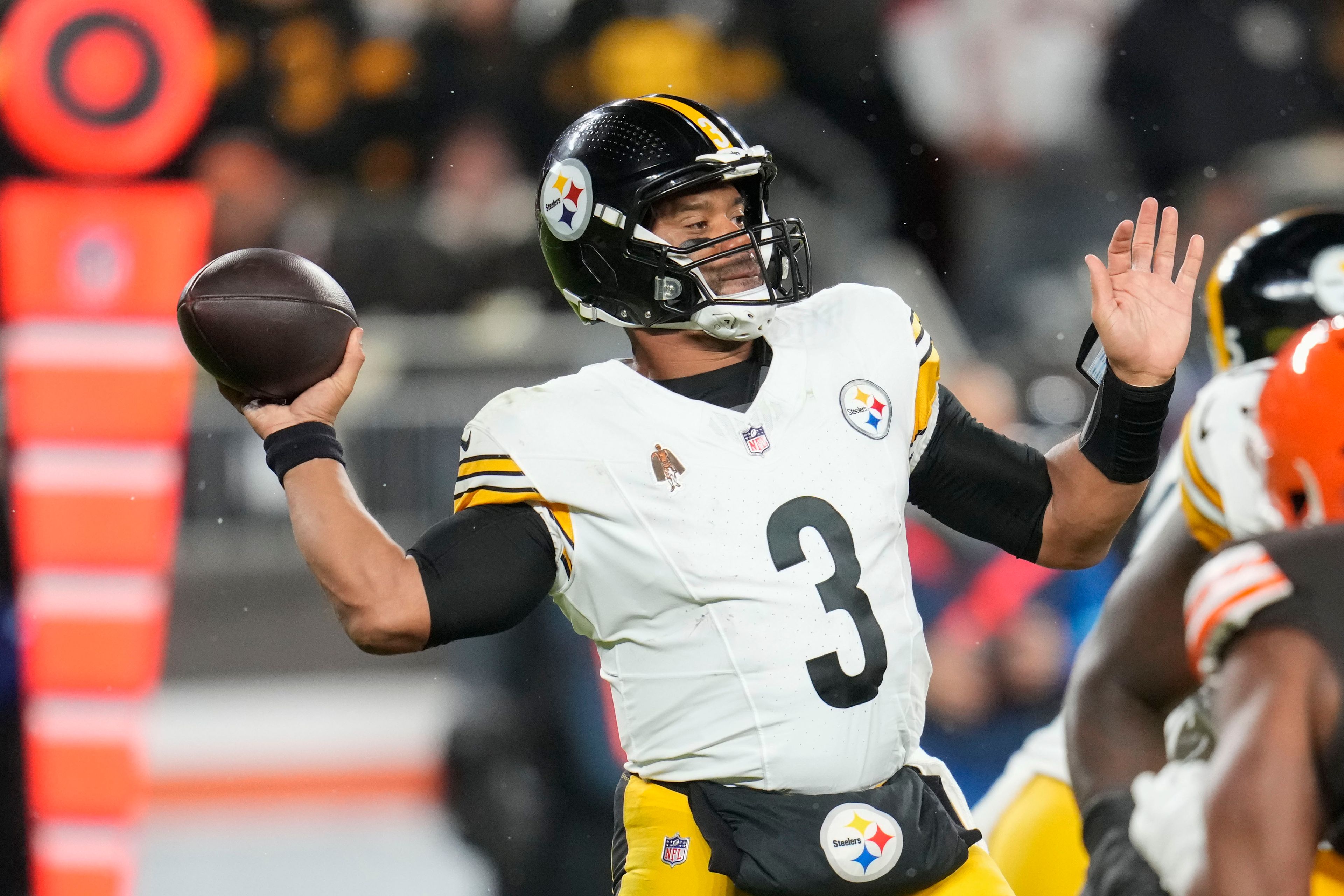 Pittsburgh Steelers quarterback Russell Wilson (3) passes in the first half of an NFL football game against the Cleveland Browns, Thursday, Nov. 21, 2024, in Cleveland. (AP Photo/Sue Ogrocki)