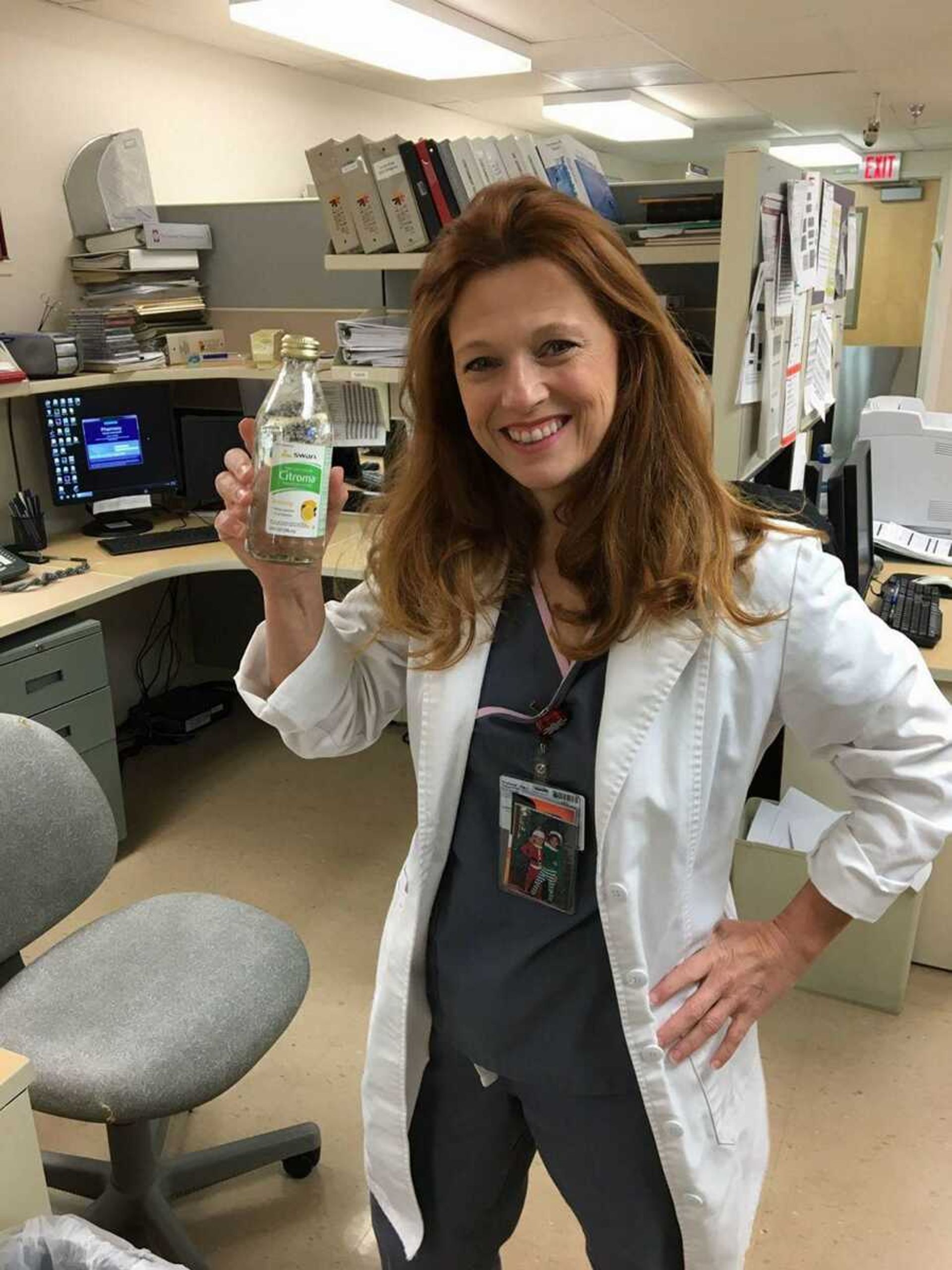 Sandi Essner on the job in a pharmacy Jan. 1, 2016, before her diagnosis.