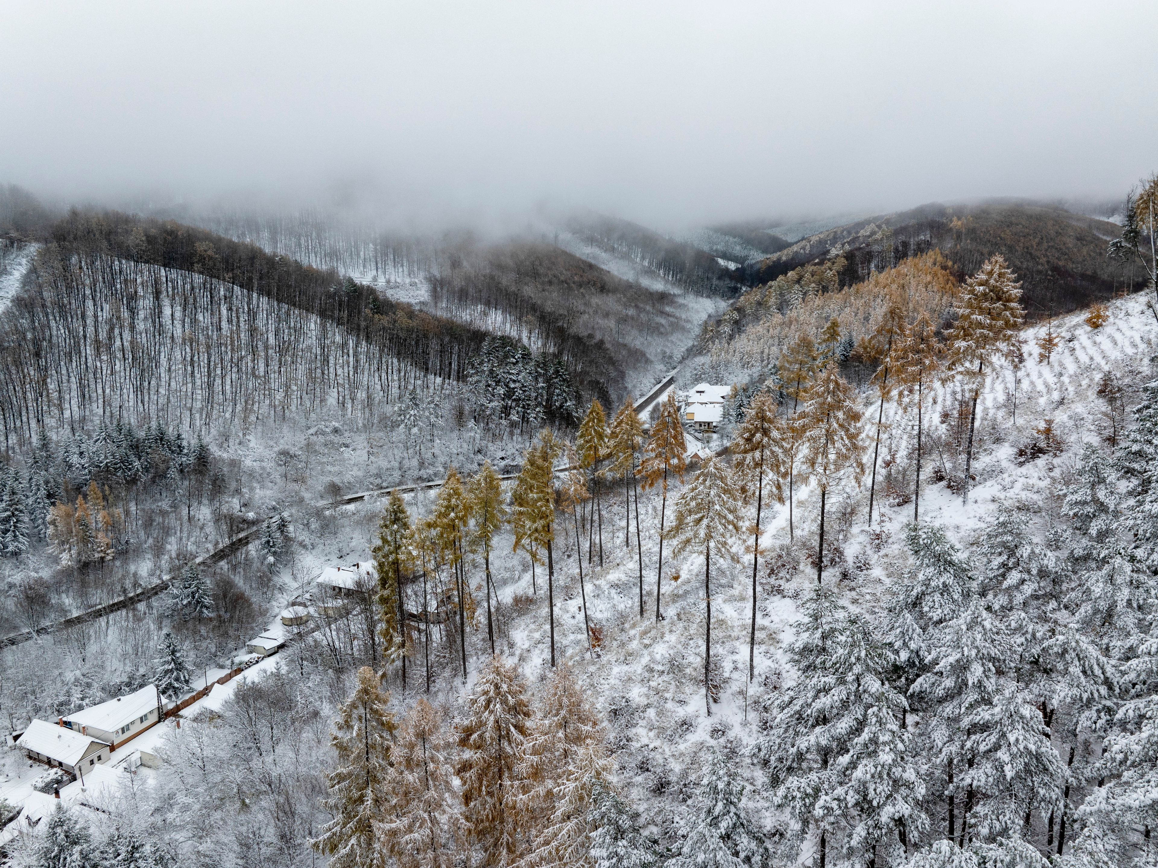 Snow covers the village of Matrakeresztes, Hungary, after an overnight snowfall, Friday, Nov. 22, 2024. (Peter Komka/MTI via AP)