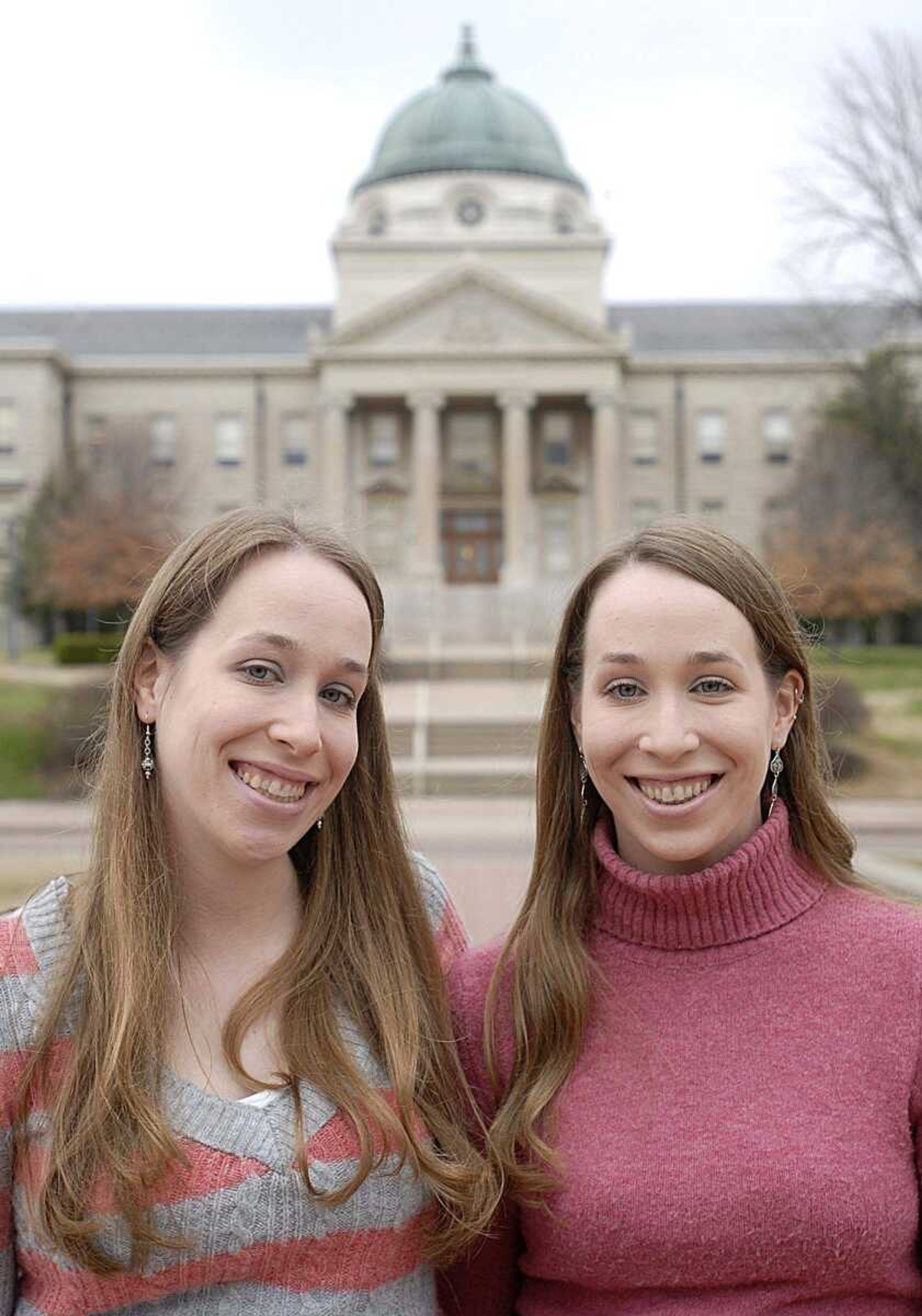 Twins Michelle, left, and Jennifer Nedilnycky are graduating today with the same degree in education, having taken all their classes together.  <br>AARON EISENHAUER<br>aeisenhauer@semissourian.com