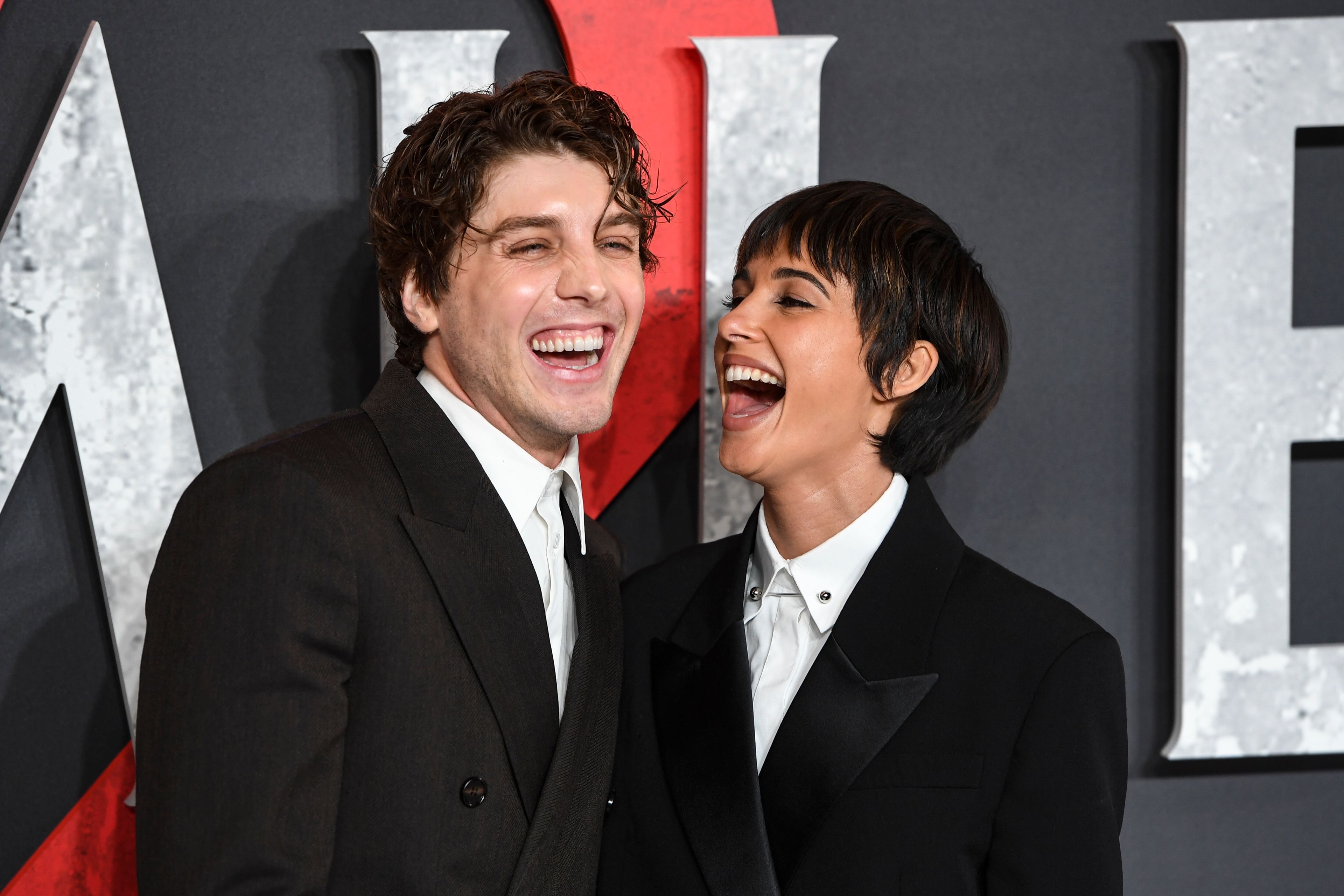 Lukas Gage, left, and Naomi Scott pose for photographers upon arrival at the premiere for the film 'Smile 2' on Tuesday, Oct. 8, 2024, in London. (Photo by Thomas Krych/Invision/AP)