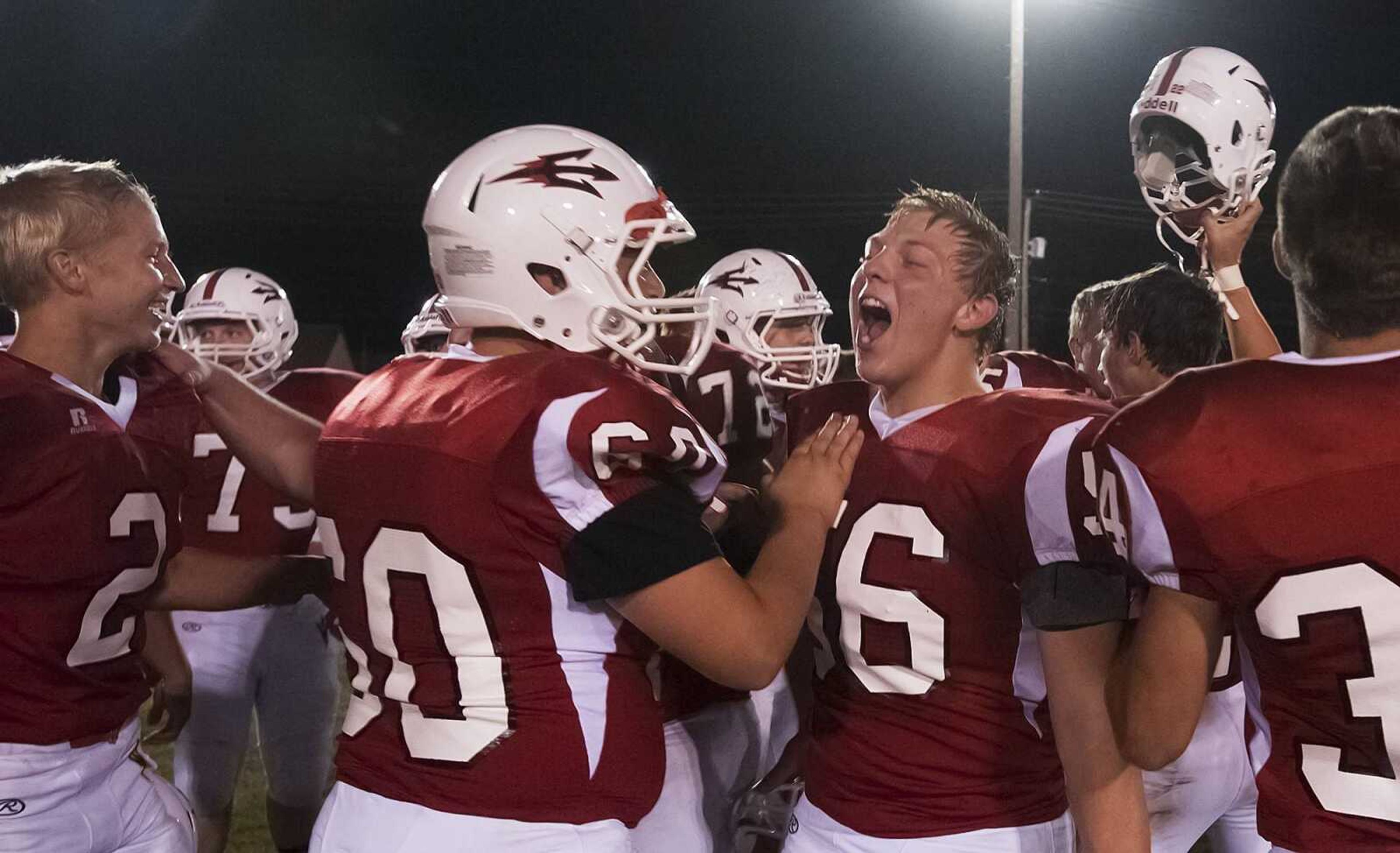 Chaffee' players celebrate as the clock runs out in the fourth quarter of the Red Devil's 28-18 win over the Malden Green Wave Fridayat Chaffee High School. (Adam Vogler)