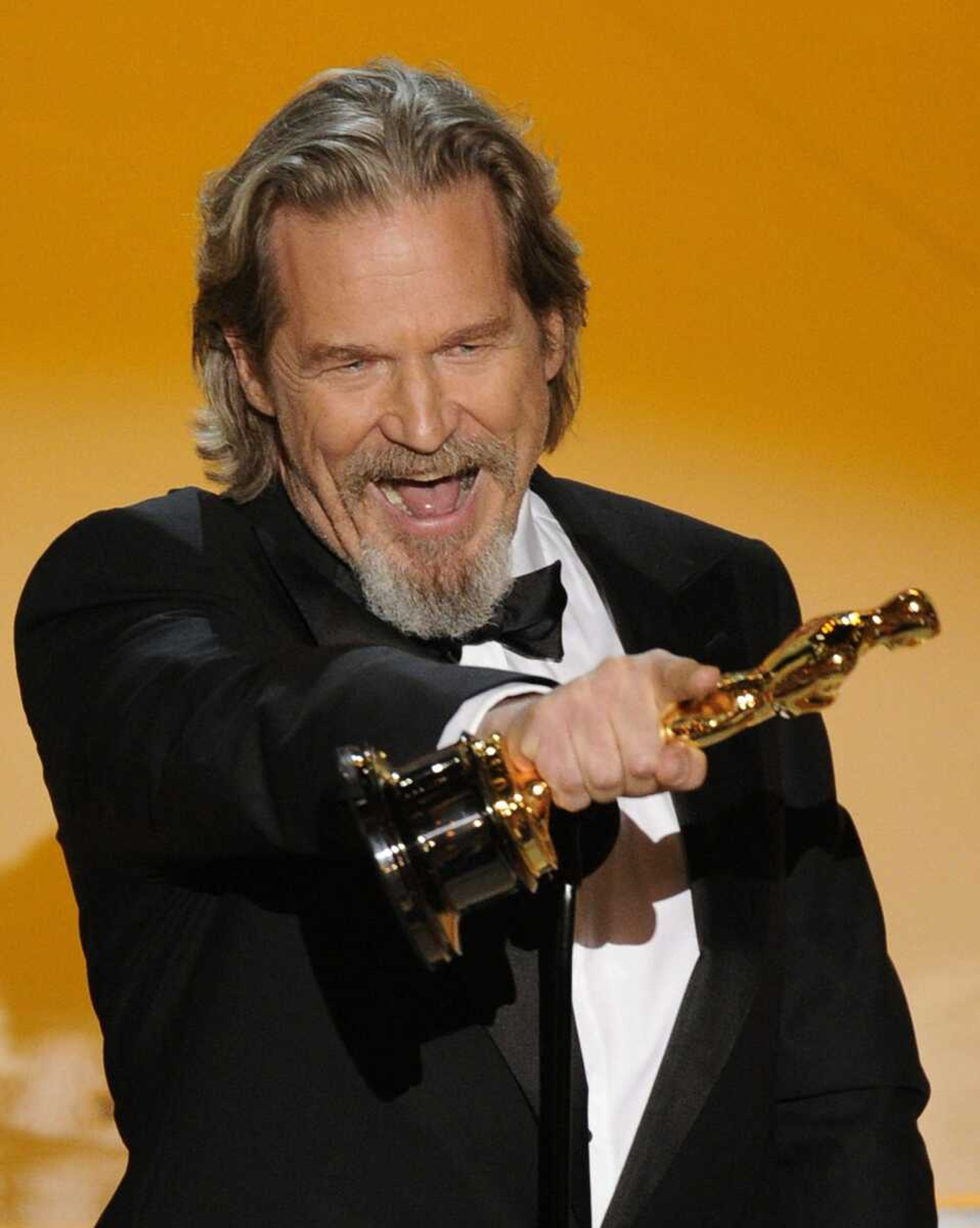 Jeff Bridges accepts the Oscar for best performance by an actor in a leading role for &#236;Crazy Heart&#238; at the 82nd Academy Awards Sunday, March 7, 2010, in the Hollywood section of Los Angeles. (AP Photo/Mark J. Terrill)