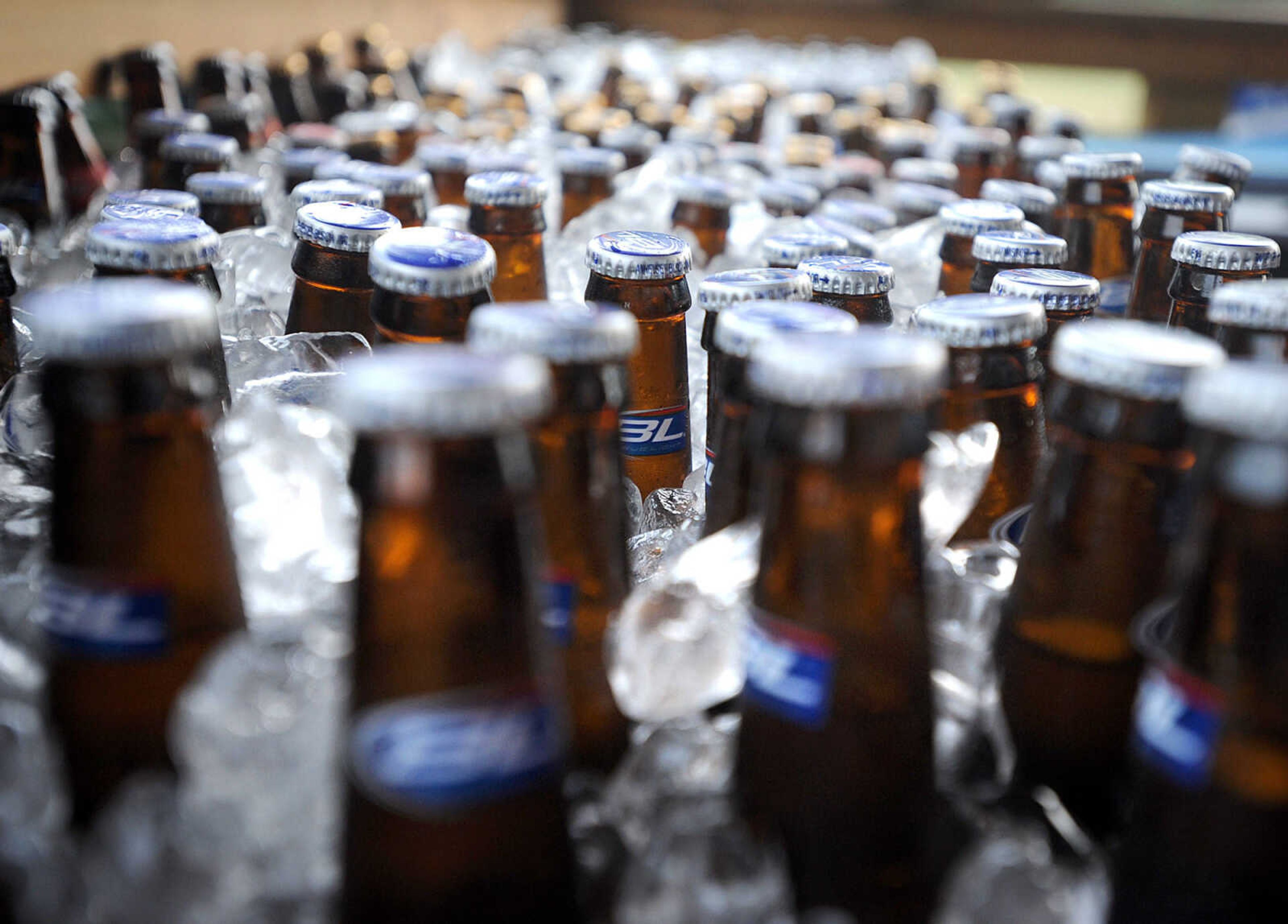 LAURA SIMON ~ lsimon@semissourian.com
Beer chills on ice as the Backstreet Cruisers perform Sunday, July 8, 2012 at the Bayou Bar & Grill in Pocahontas, Mo. The St. Louis based band performs music from the 1950's and 60's.