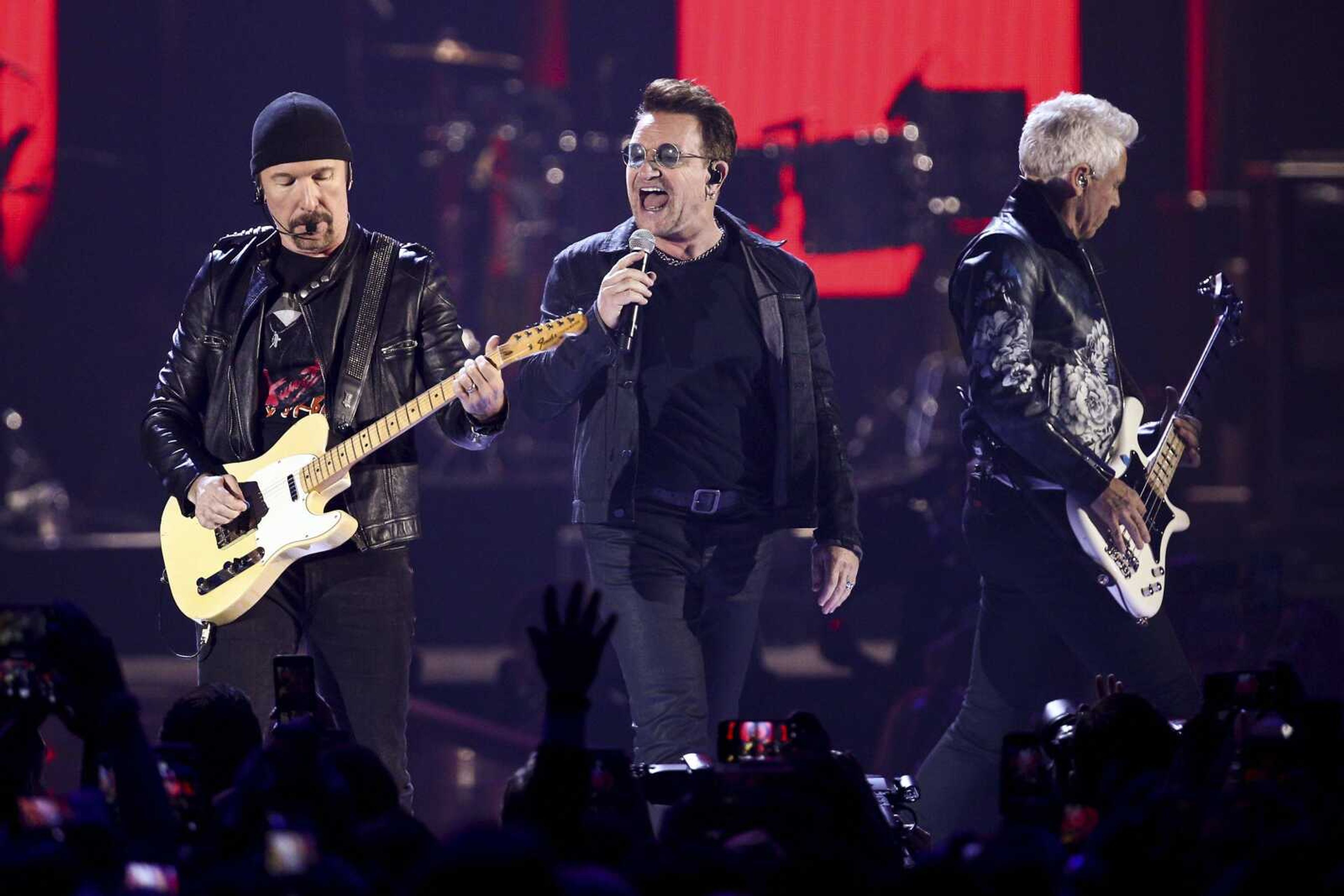 The Edge, left, Bono and Adam Clayton of the music group U2 perform at the 2016 iHeartRadio Music Festival at T-Mobile Arena in Las Vegas. U2 announced Monday it will play the entirety of its classic 1987 album "The Joshua Tree" at each stop during a summer stadium tour to celebrate the 30th anniversary of its release.