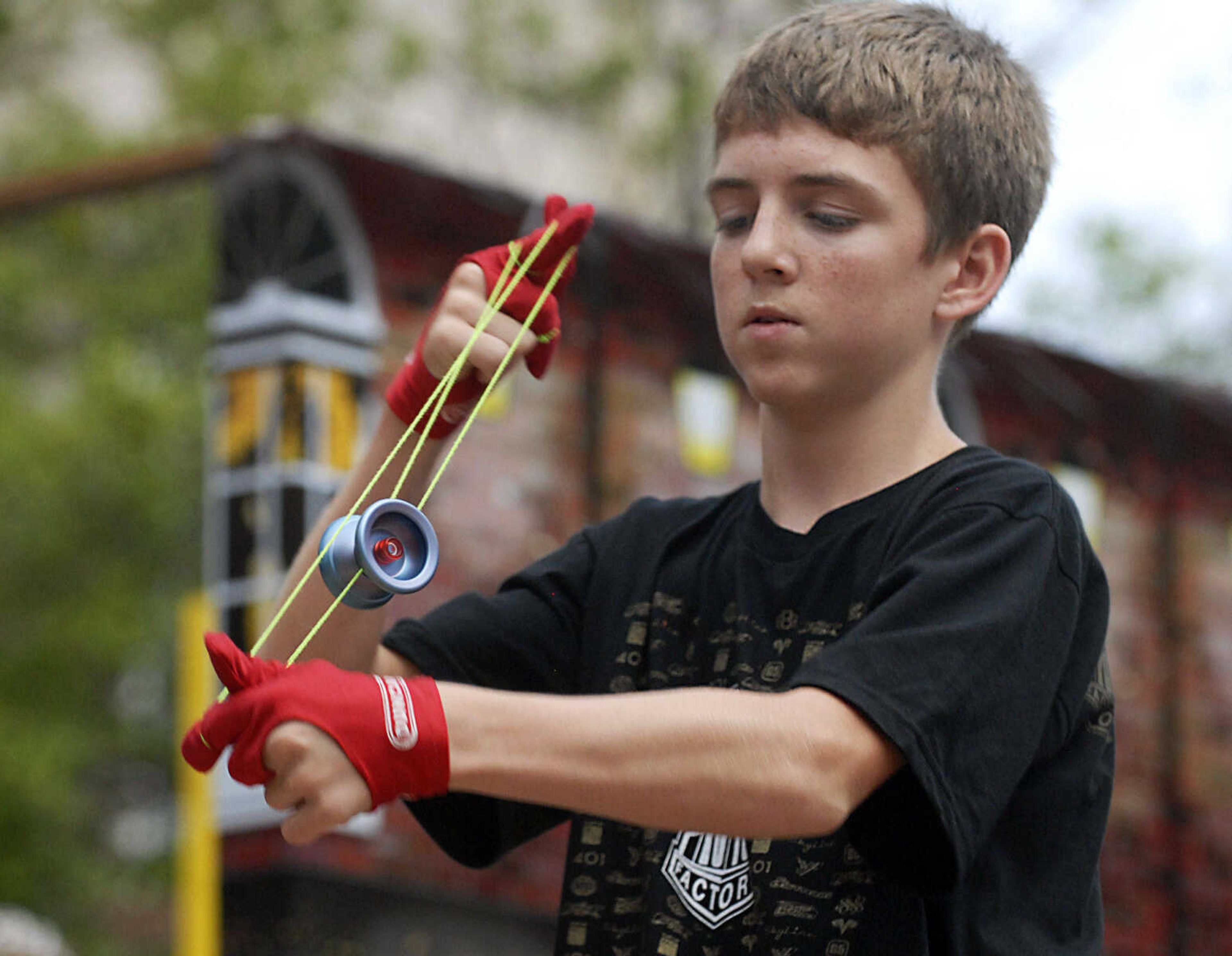 KRISTIN EBERTS ~ keberts@semissourian.com

Elijah Gahm performs his "Yo-Yo Man" act during the dance and variety category for ages thirteen to twenty-one during the preliminary round of the talent show at the 102nd Annual Homecomers Celebration in Jackson, Mo., on Thursday, July 29, 2010. Twenty-six acts participated in this year's contest. Thursday's top performers will advance to the finals on Friday.