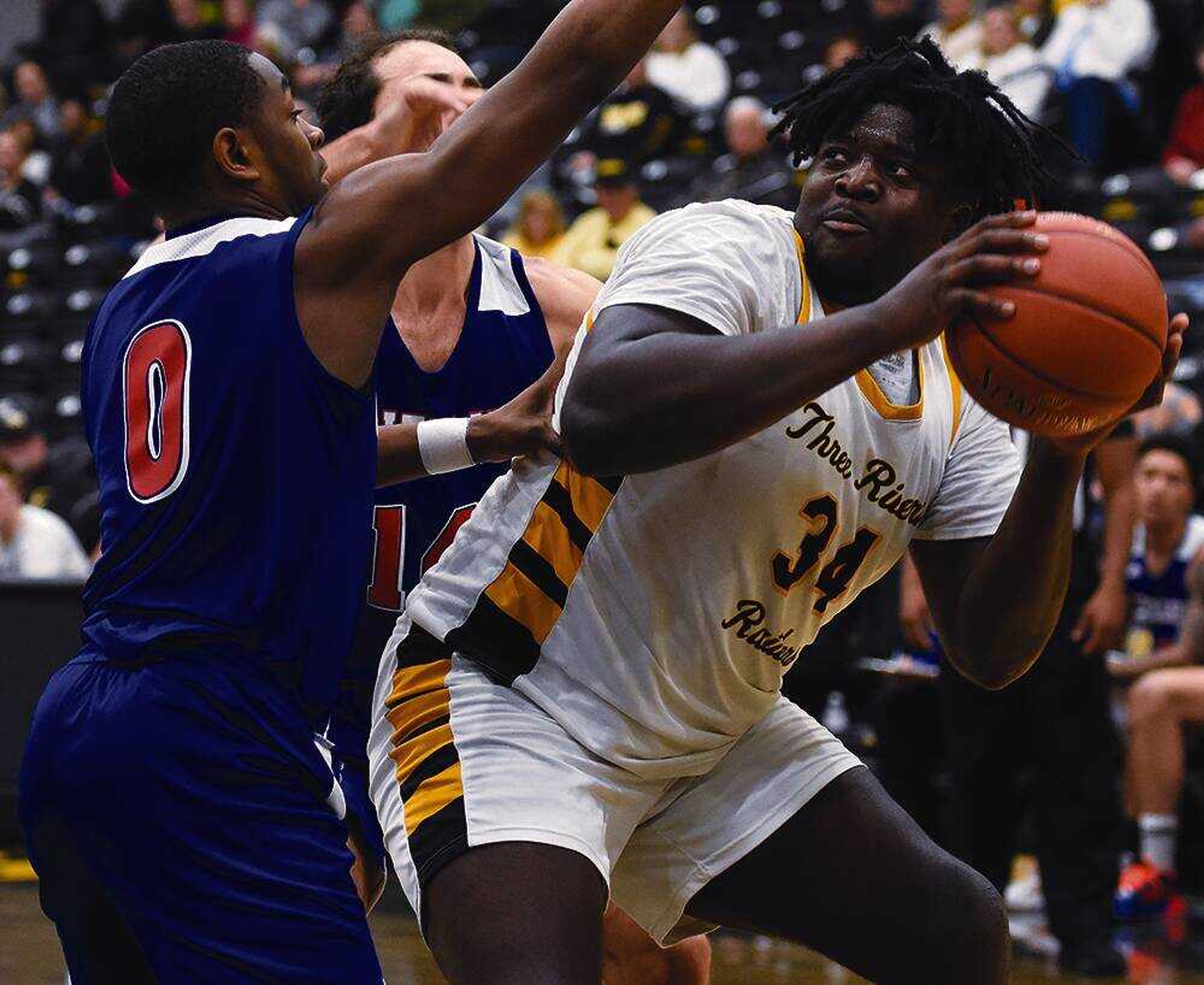 Hosana Kitenge (right) and the Three Rivers College men�s basketball team will be playing for a trip to the Region XVI championship game when they take on Mineral Area Friday in the region semifinals in Jefferson City. 