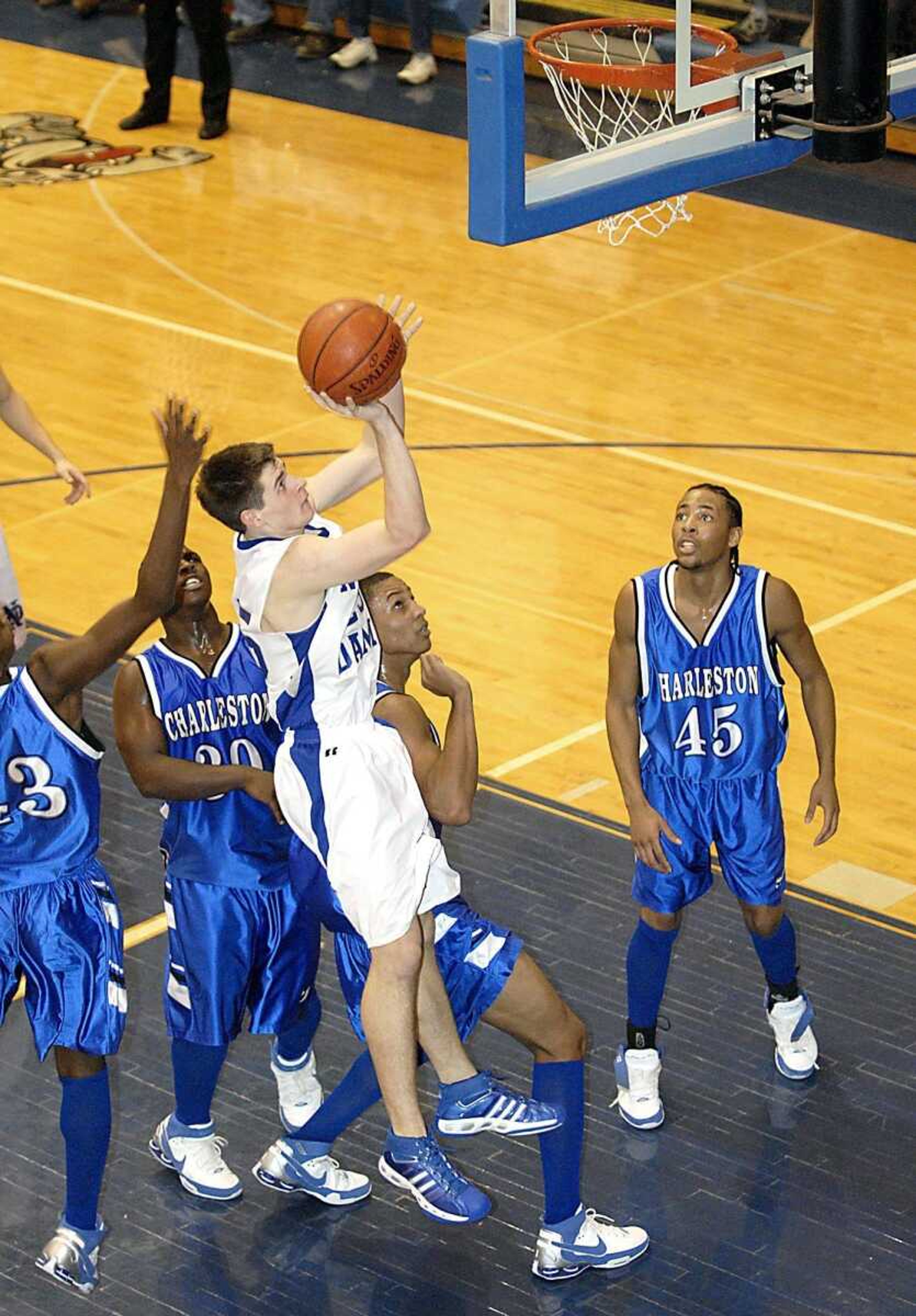 Notre Dame's Austin Greer shot while surrounded by four Charleston defenders during Tuesday's game at Notre Dame Regional High School. (Kit Doyle)