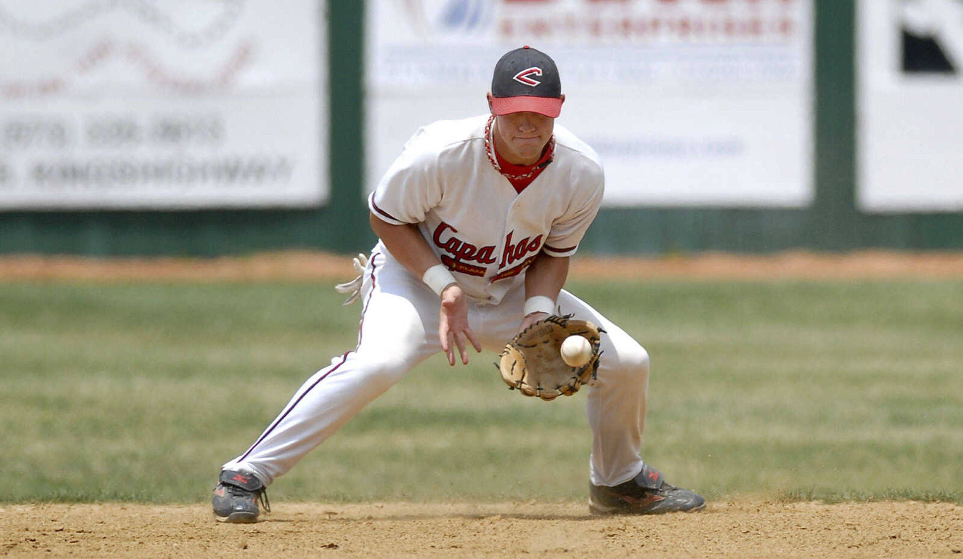 KIT DOYLE ~ kdoyle@semissourian.com
Capahas second baseman Kendall Deason stays low on a hopper Saturday, June 13, 2009, at Capaha Field.