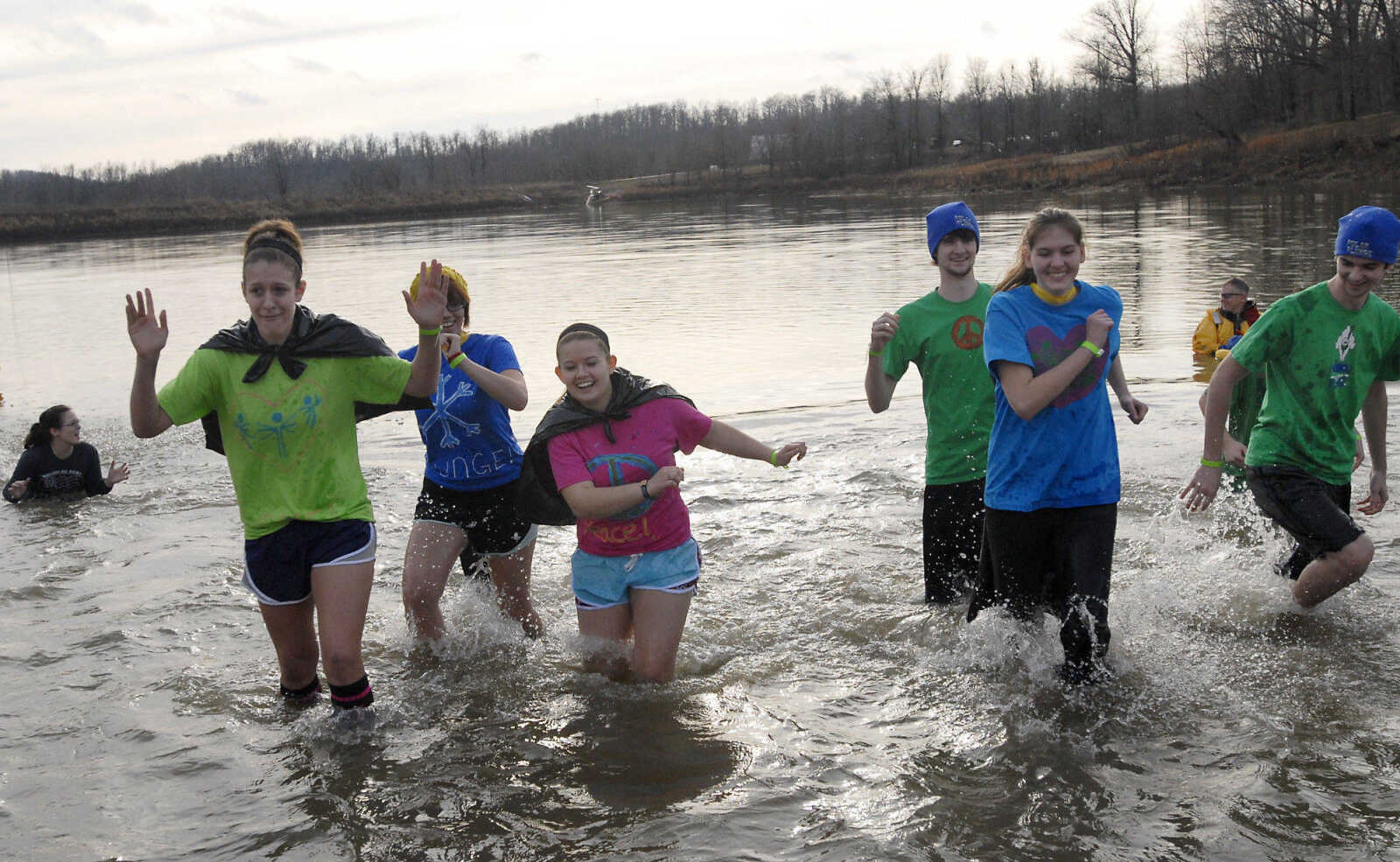 KRISTIN EBERTS ~ keberts@semissourian.com

Plungers brave the water during the 2012 Polar Plunge at the Trail of Tears State Park's Lake Boutin on Saturday, Feb. 4, 2012.