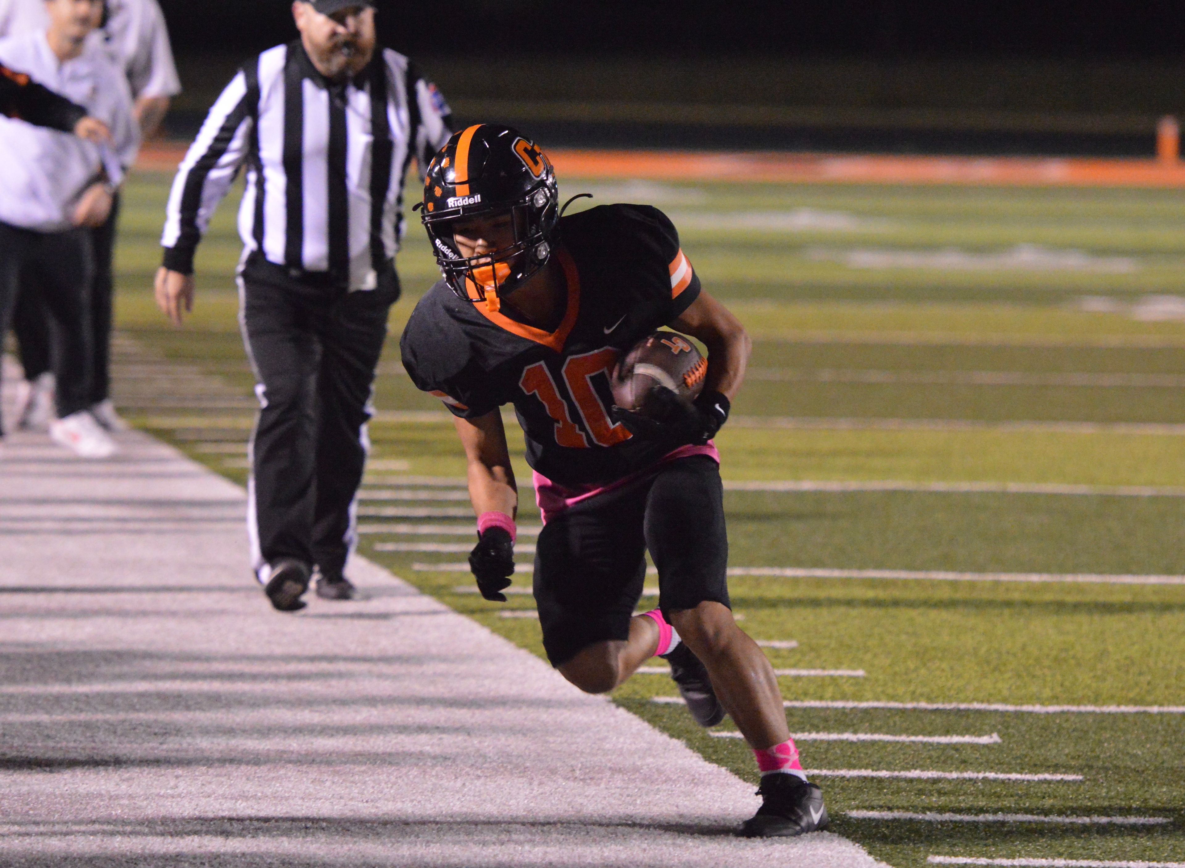 Cape Central senior wide receiver Paul Tran tip-toes out of bounds after a reception against Lift for Life Academy on Friday, Oct. 18.