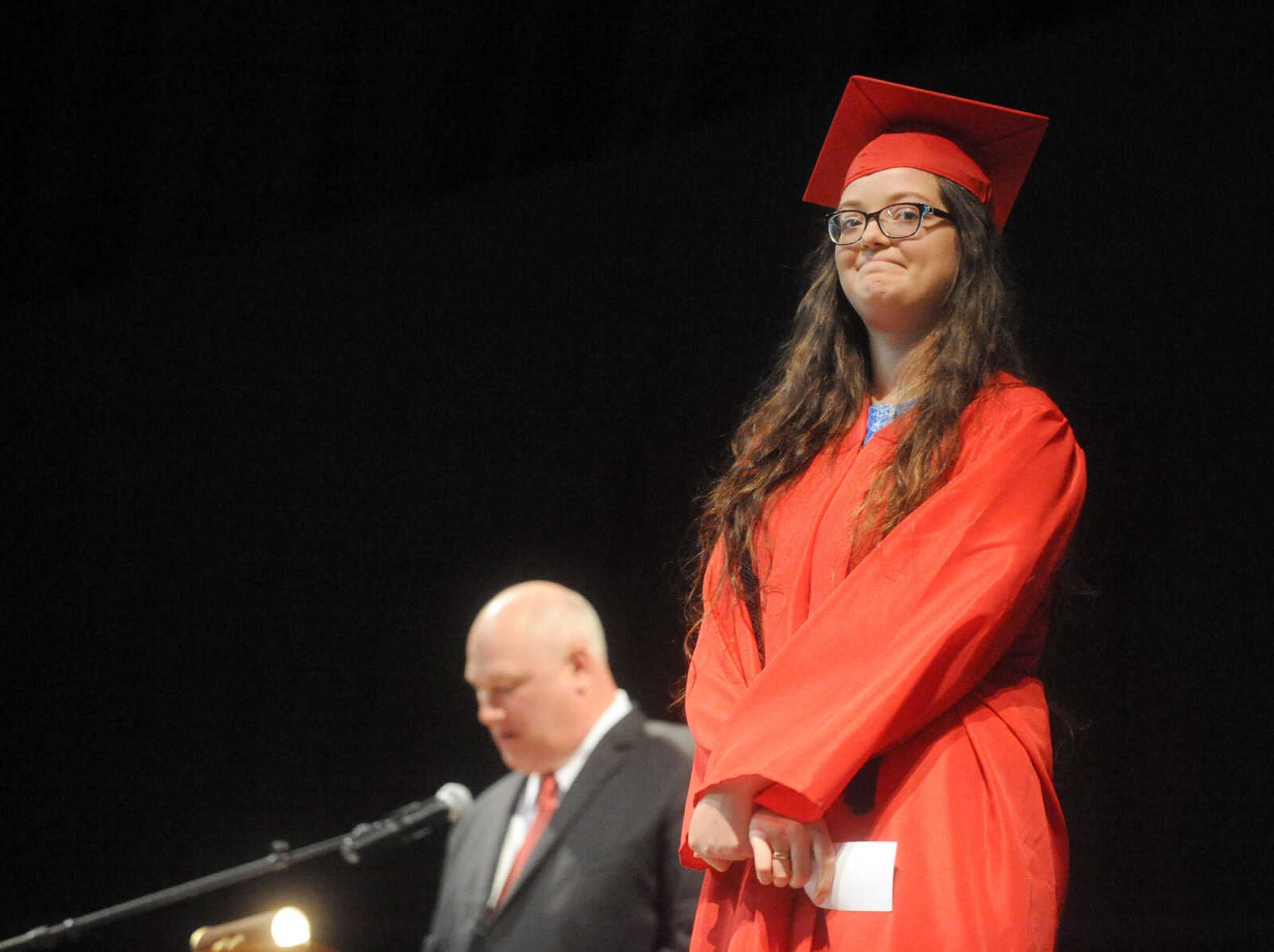 LAURA SIMON ~ lsimon@semissourian.com

Devin Murphy, valedictorian, takes the stage during the Jackson Senior High School commencement, Thursday, May 21, 2015, at the Show Me Center.