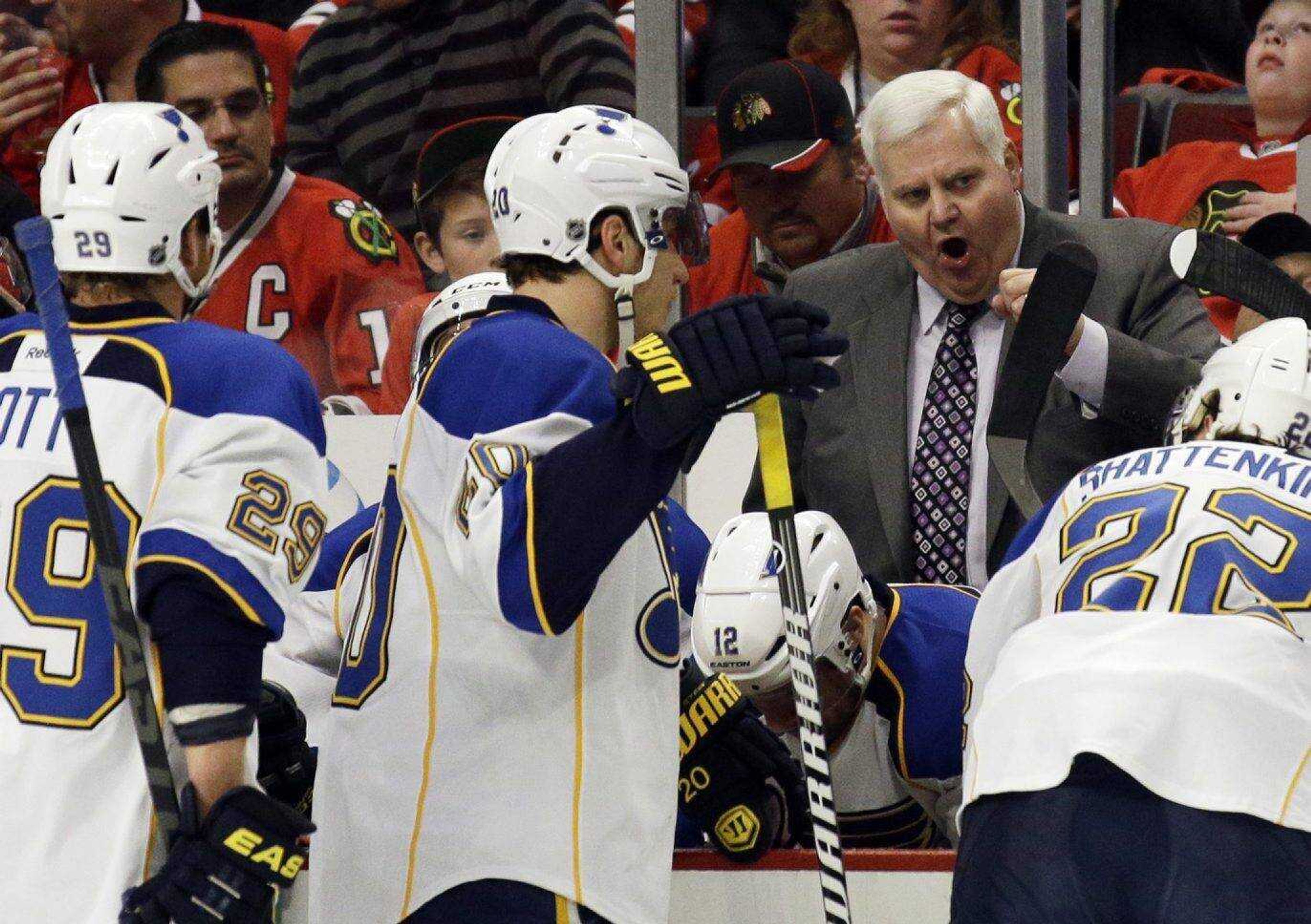 Blues coach Ken Hitchcock yells at his team during the first period in Game 4 of their NHL first-round playoff series Sunday against the Blackhawks in Chicago. (Nam Y. Huh ~ Associated Press)