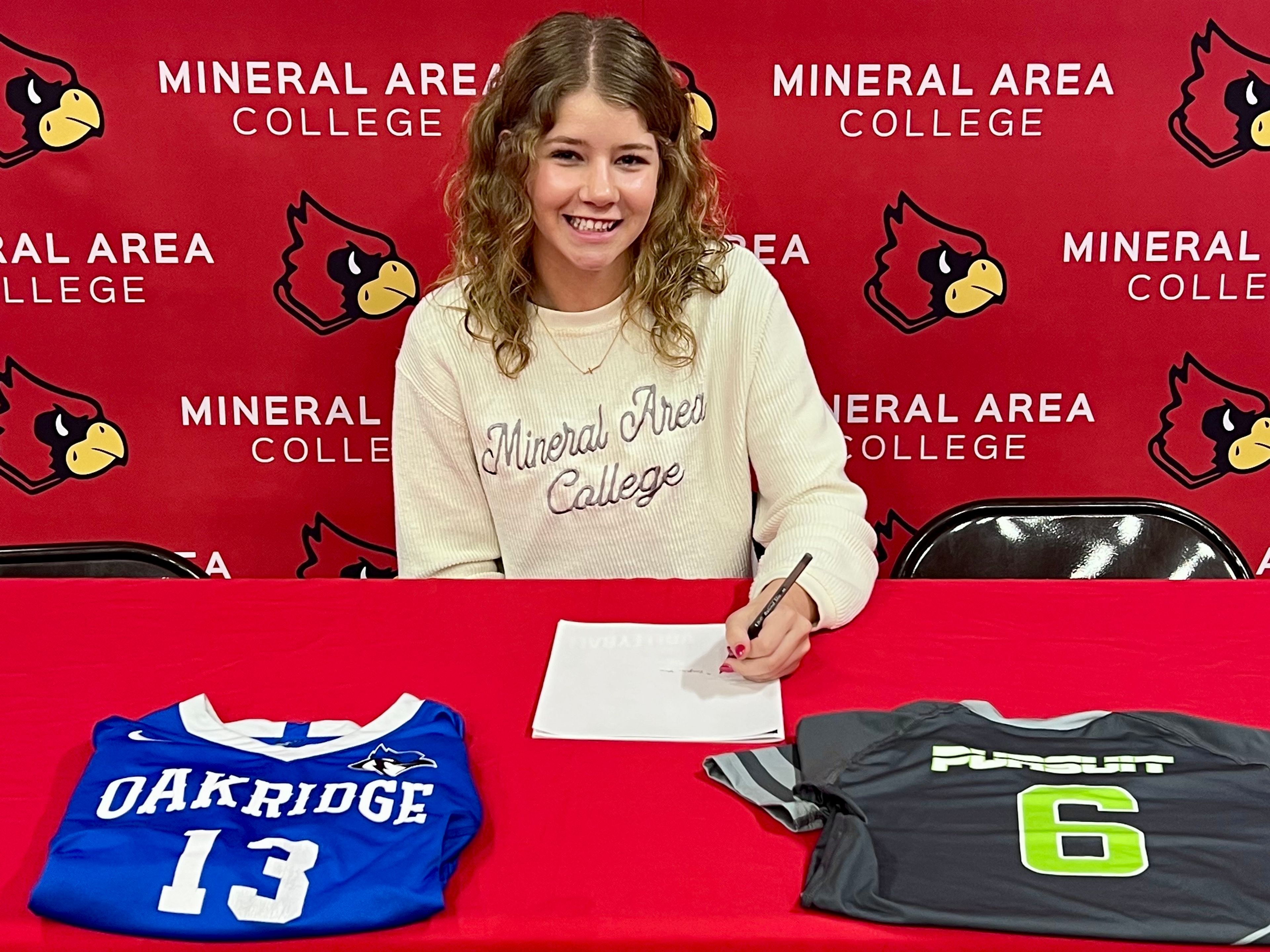 Oak Ridge senior Reagan Howe signs her letter of intent to play volleyball at Mineral Area College on Tuesday, Nov. 26, at Oak Ridge High School. 