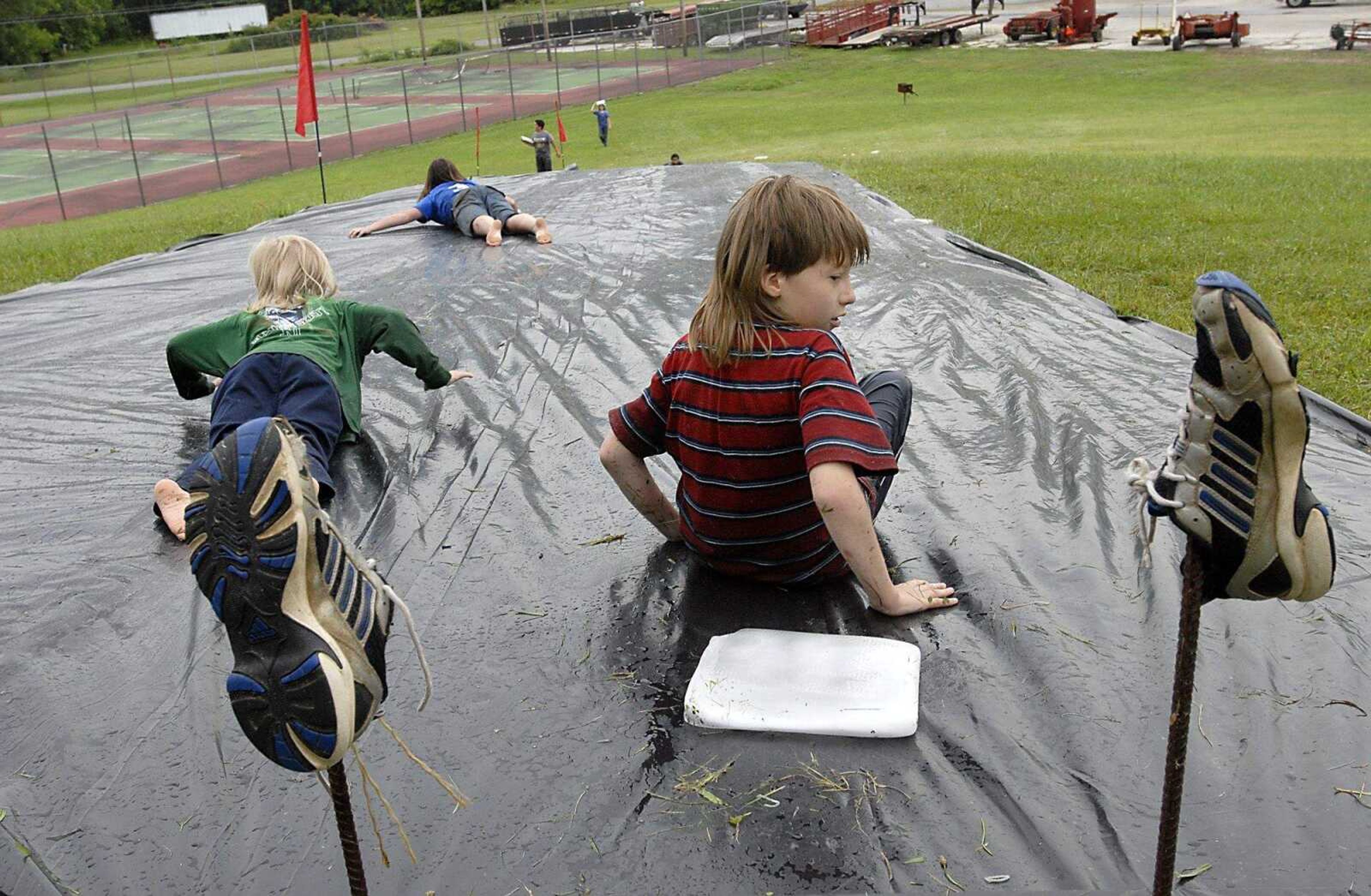 KIT DOYLE ~ kdoyle@semissourian.com
Ice blocking at Pellegrino Park Saturday, June 28, 2008, in Marble HIll.