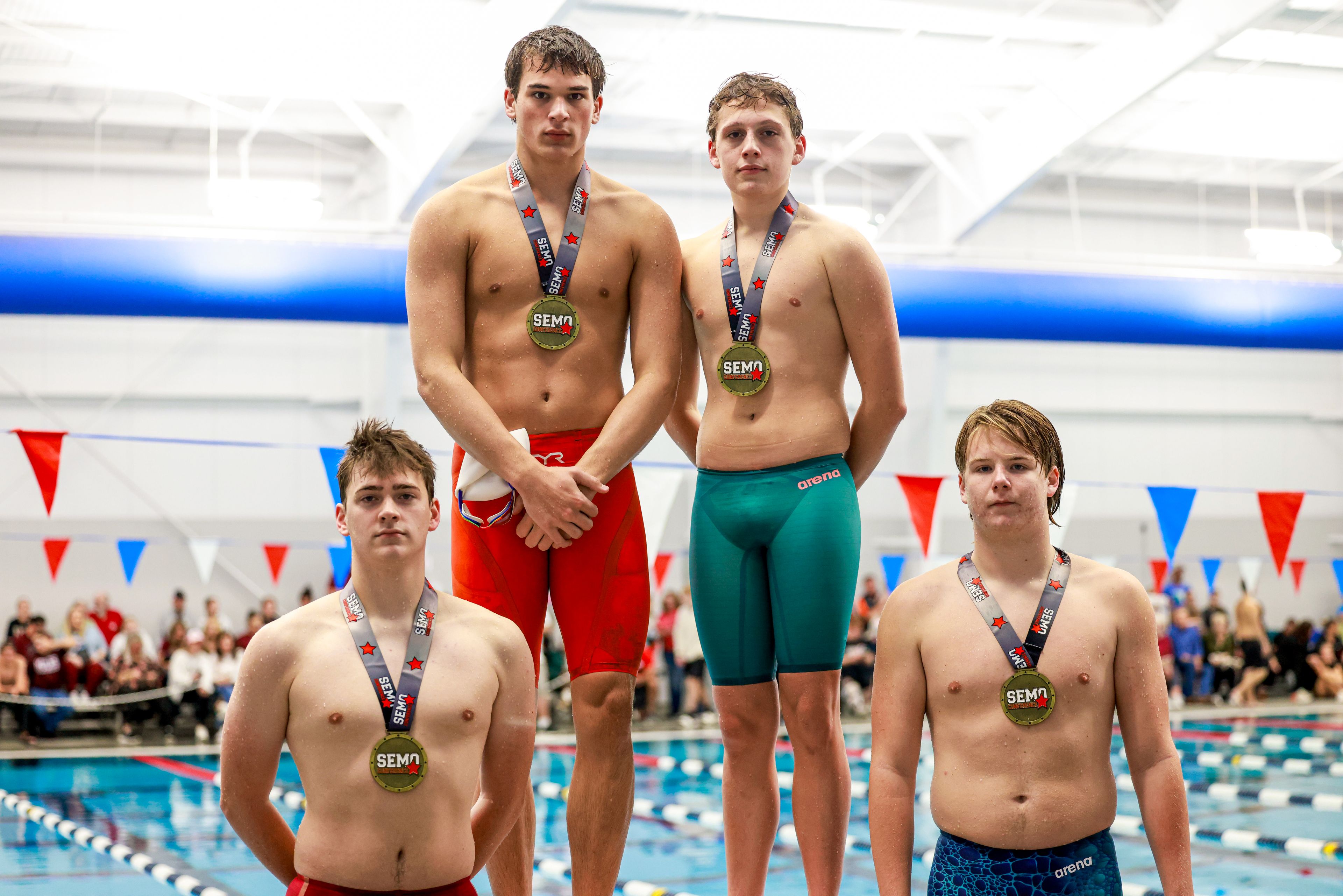 Notre Dame swimmers pose with their gold medals after winning the 200-yard freestyle relay in the SEMO Conference championships Tuesday, Nov. 5, at the Cape Aquatic Center in Cape Girardeau.