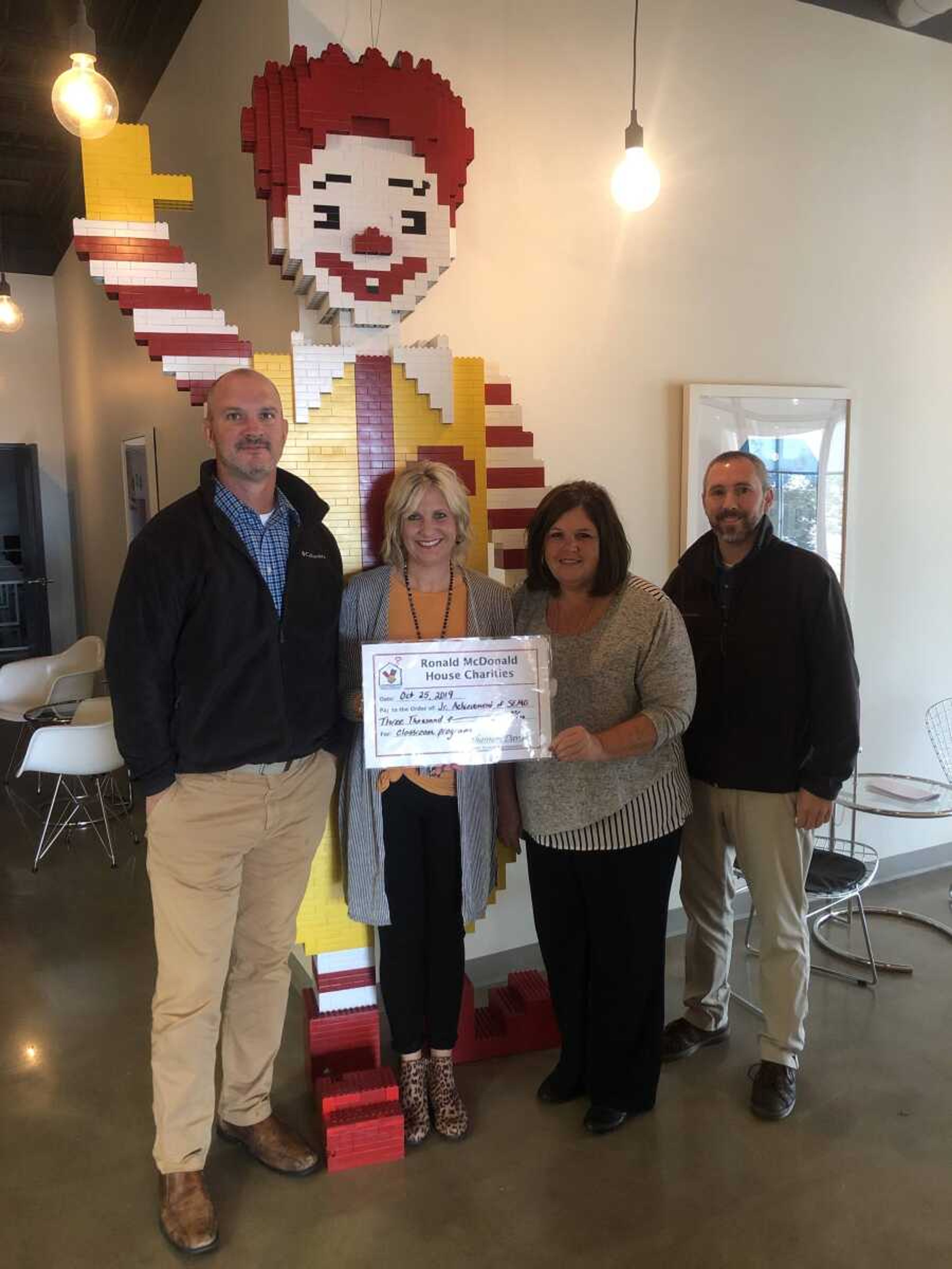 Pictured; John Haggerty, Supervisor for McDonalds;  Becki Arends, Junior Achievement in SEMO;  Cheryl Farrow, Director of Operations for McDonalds;  and Shane Brumfield, Supervisor for McDonalds.