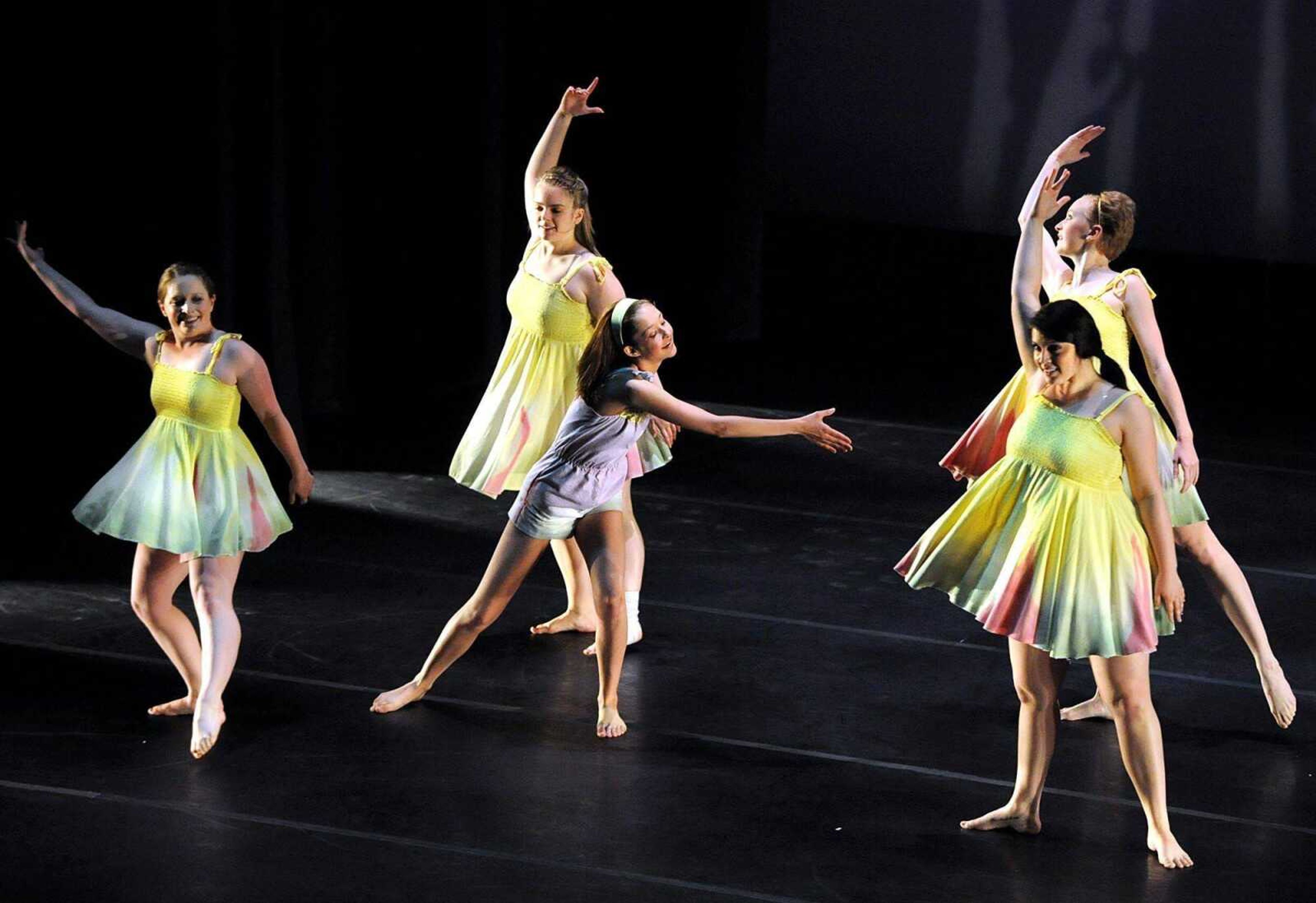 Kara Burley, Katie Farrell, Katrina Guittar, Rachel Hunsell and Shannon O'Keefe perform "Open to the Sky," choreographed by Laura Roth during last year's Spring into Dance at Southeast Missouri State University's River Campus.
(Laura Simon)