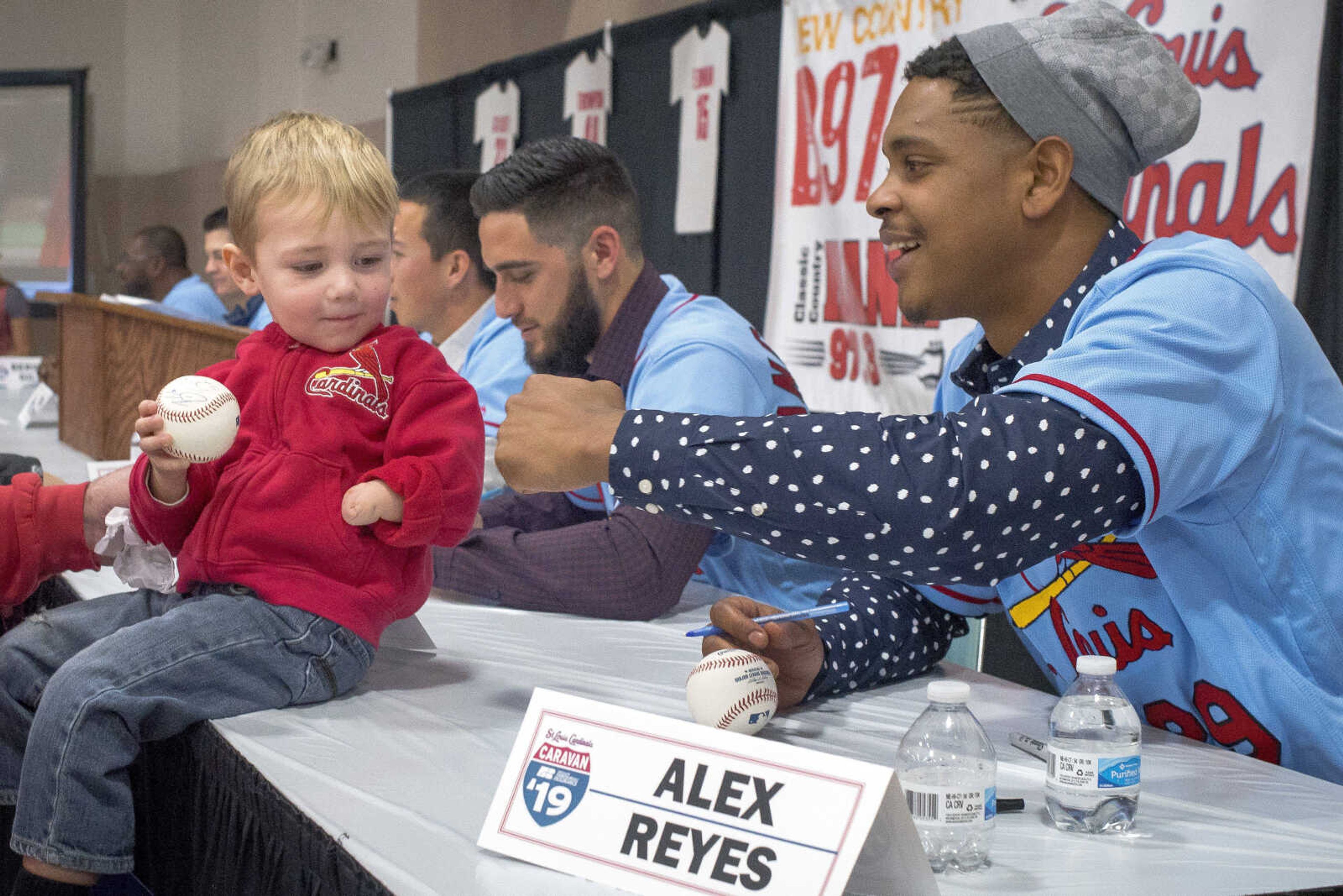 TJ Merriman, 3, gets a fist-bump from St. Louis Cardinals pitcher Alex Reyes during the Cardinals Caravan event Monday, Jan. 21, 2019,&nbsp;at the Osage Centre in Cape Girardeau.&nbsp;