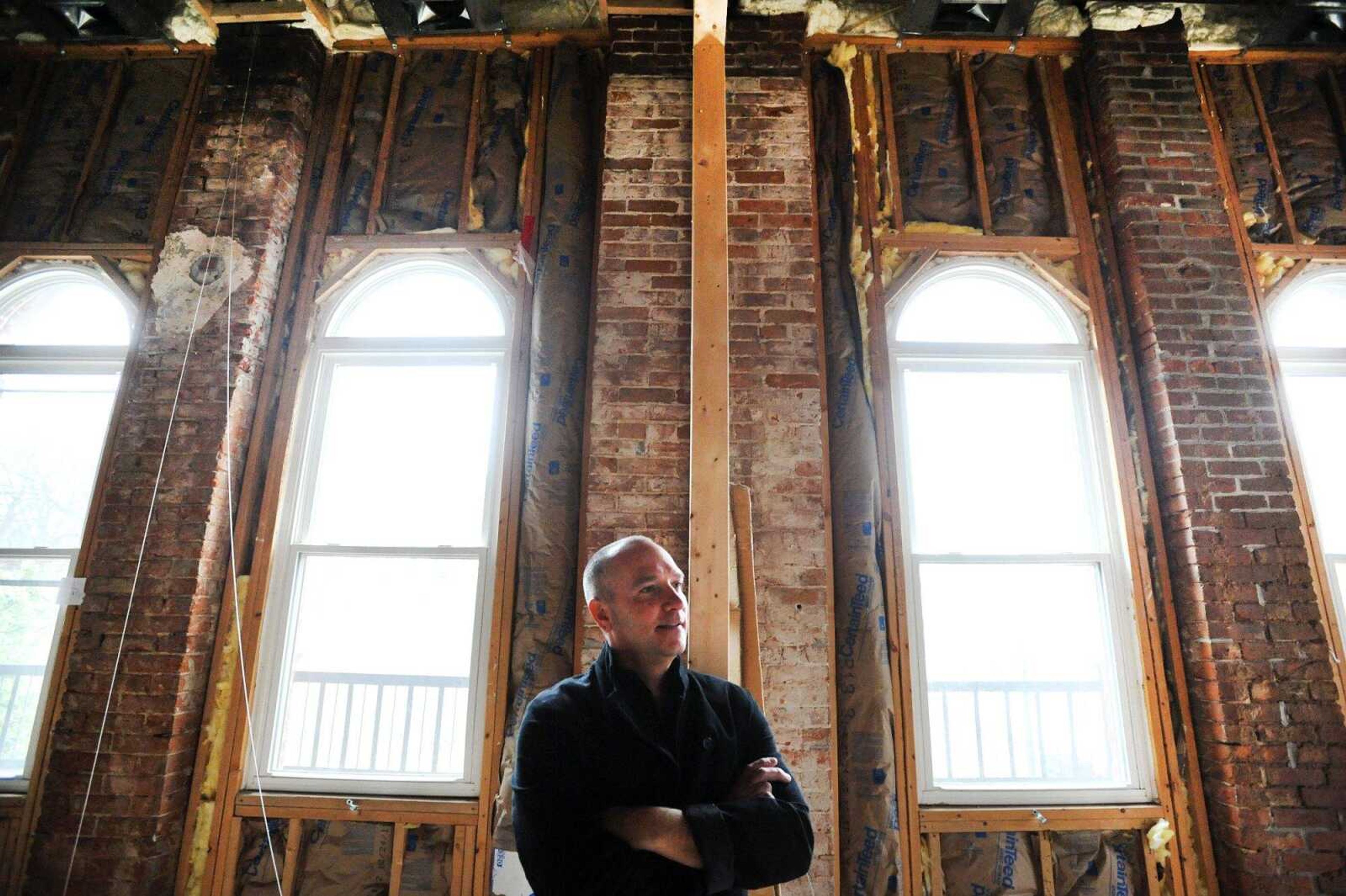 Mike Rust stands on the top floor of the former Keys music store building Tuesday in downtown Cape Girardeau. Rust, owner of Rust & Martin, is renovating the building to house a retail shop on the main floor, a workshop on the second floor and a private residence on the top floor. (Laura Simon)