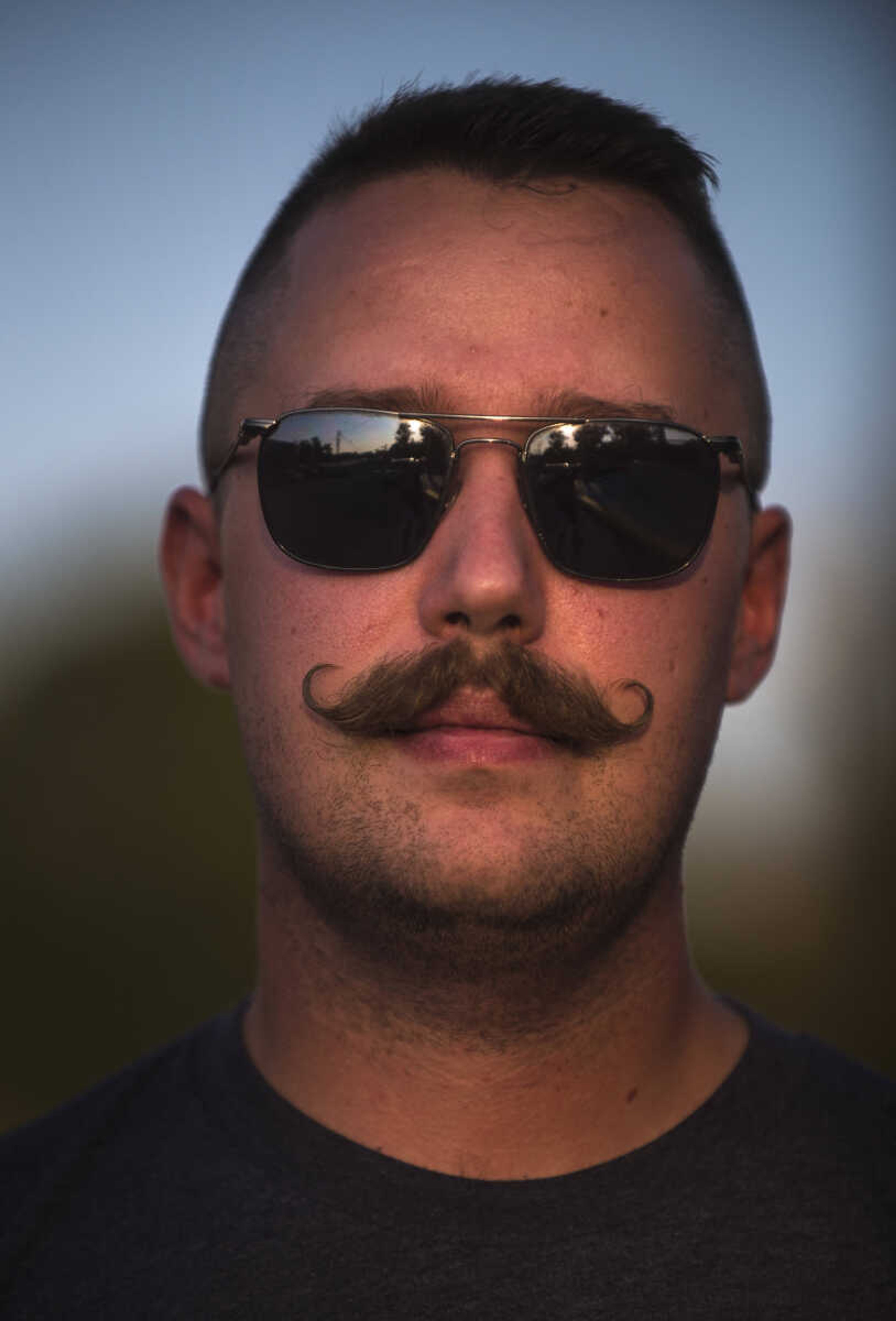 Josh McAtee poses for a photo during the Perryville Pinup contest Saturday, Sept. 2, 2017 in downtown Perryville.