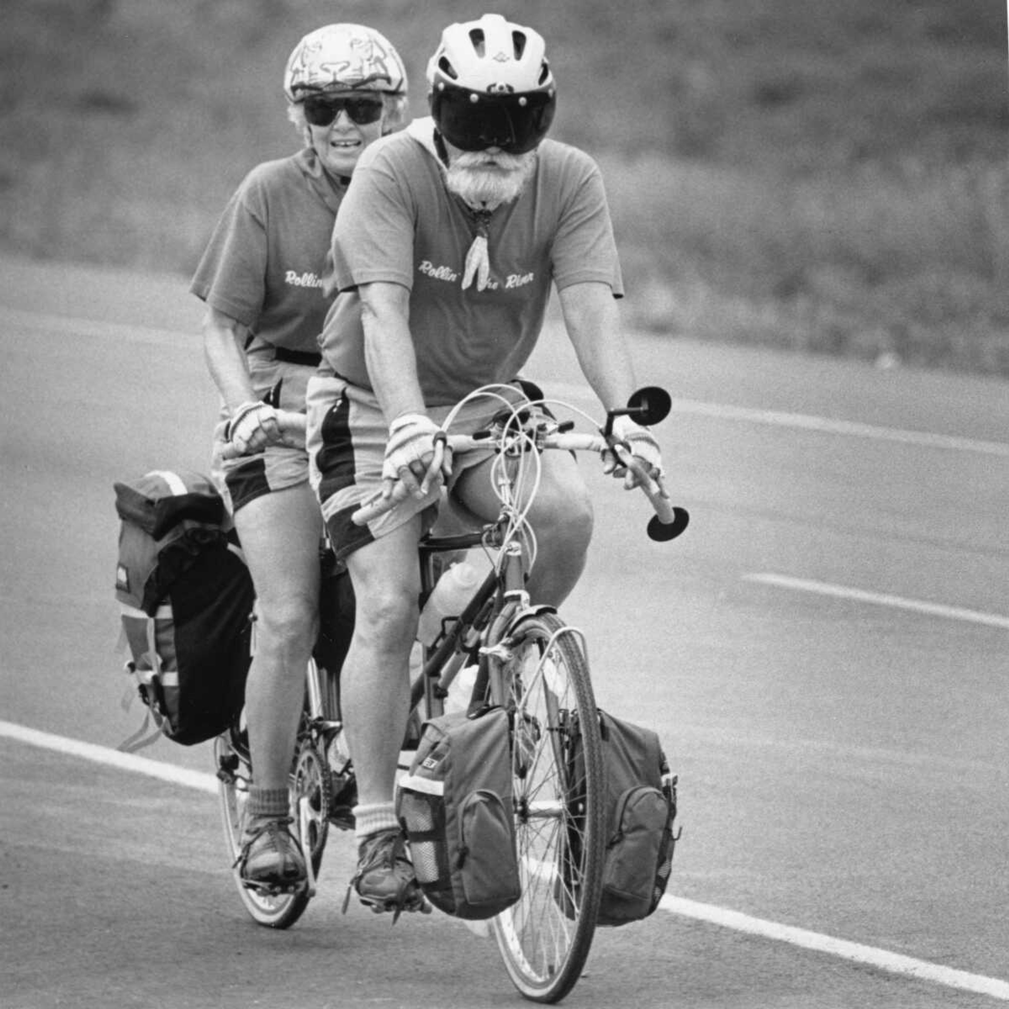 Gale Simon, 65, and his wife, Nell, 70, of Richmond, Calif., pedaled their bicycle-built-for-two down Route K from Gordonville to Cape Girardeau. The couple was bicycling along the Mississippi River from its beginning at Lake Itasca, Minn., to its entry into the Gulf of Mexico at Venice, La. The two averaged about 60 miles a day. (Published June 2, 1992)