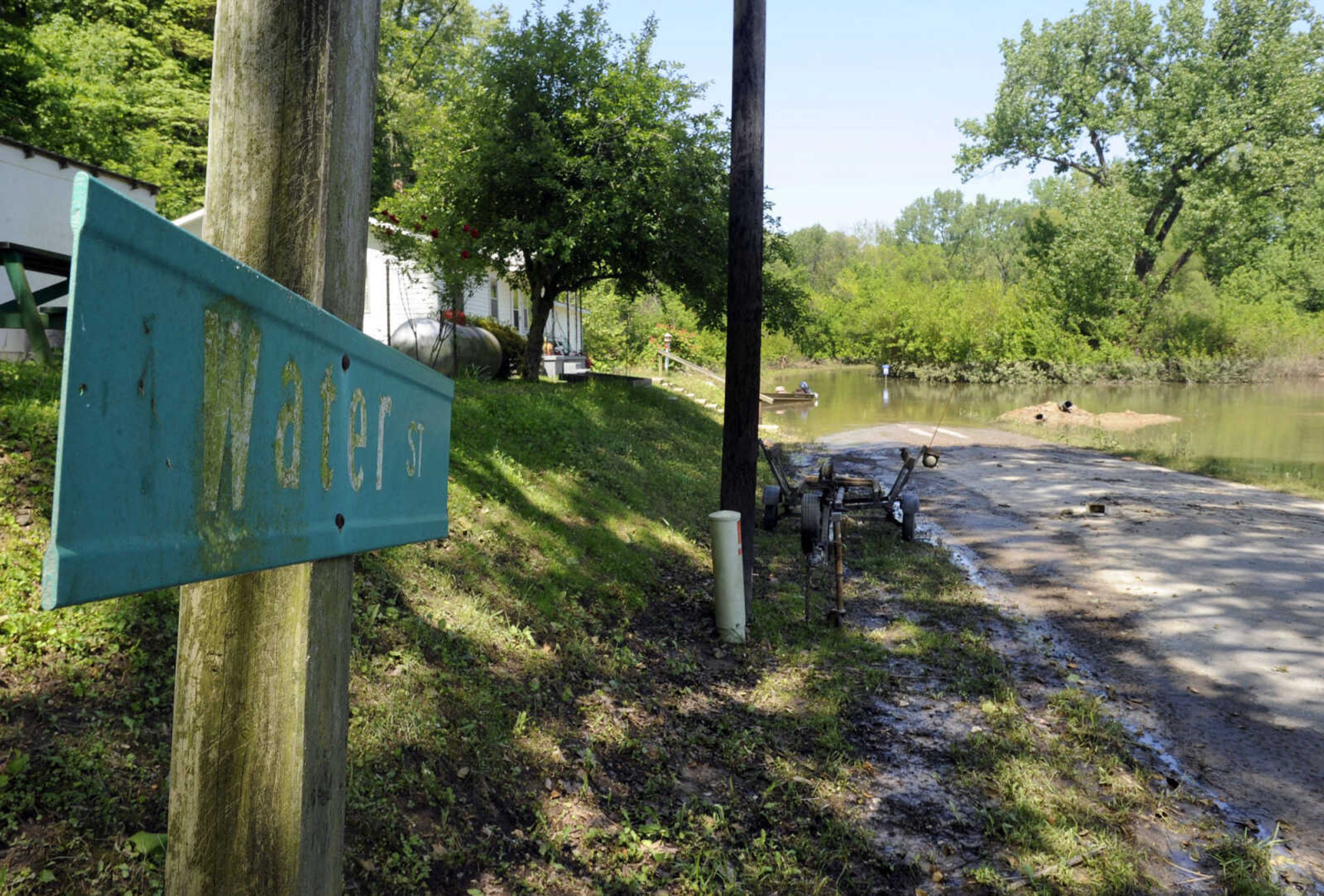 FRED LYNCH ~ flynch@semissourian.com
Water still covers Scott County Road 321, Water Street, Sunday, May 8, 2011 in Commerce, Mo.