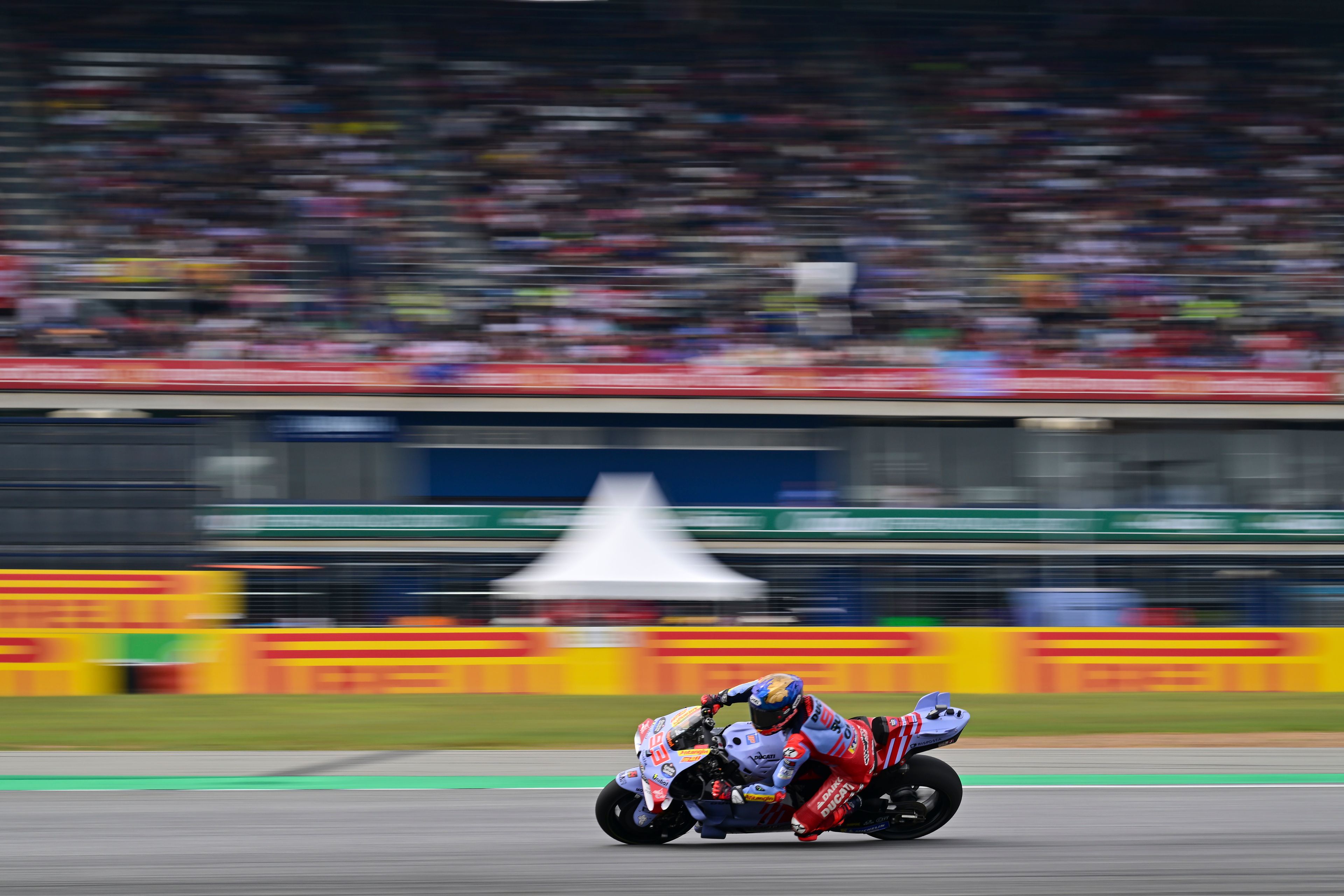 Spain's rider Marc Marquez steers his motorcycle during a practice round of Thailand's MotoGP at the Chang International Circuit in Buriram, Thailand, Saturday, Oct. 26, 2024. (AP Photo/Kittinun Rodsupan)