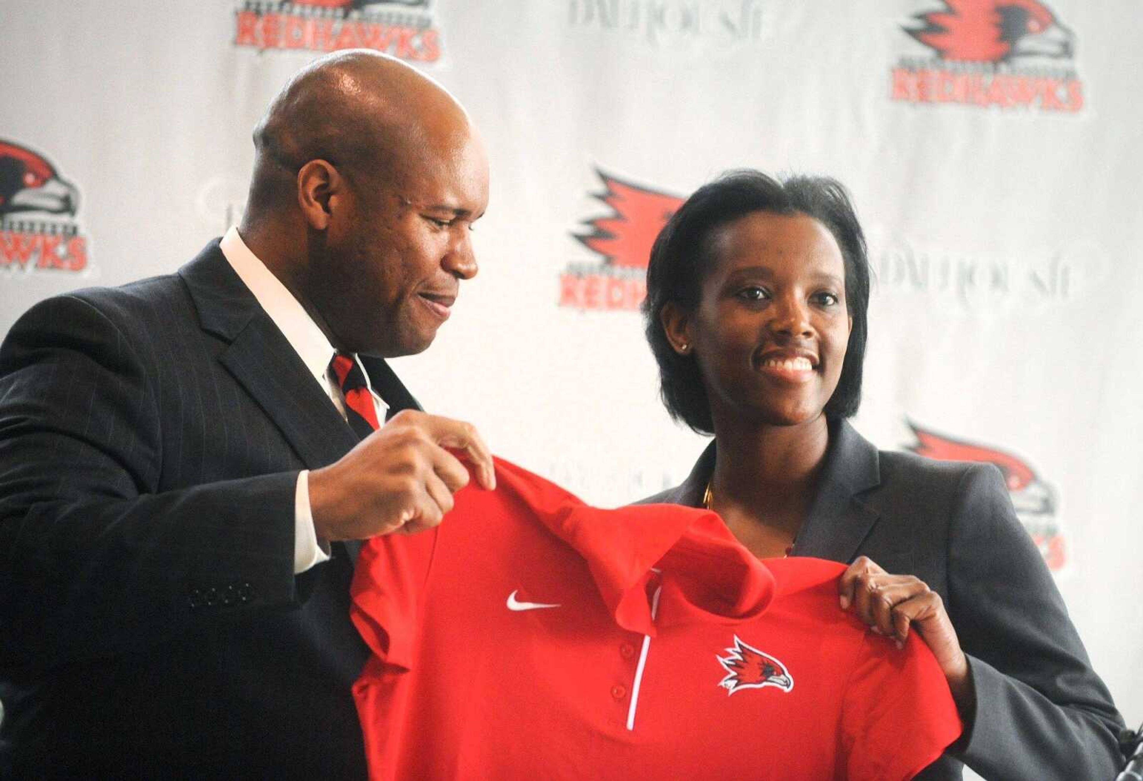 Southeast Missouri State University Athletic Director, Mark Alnutt introduces Rekha Patterson during a press conference Wednesday, April 15, 2015, naming Patterson has the new head women's basketball coach at Southeast. (Laura Simon)