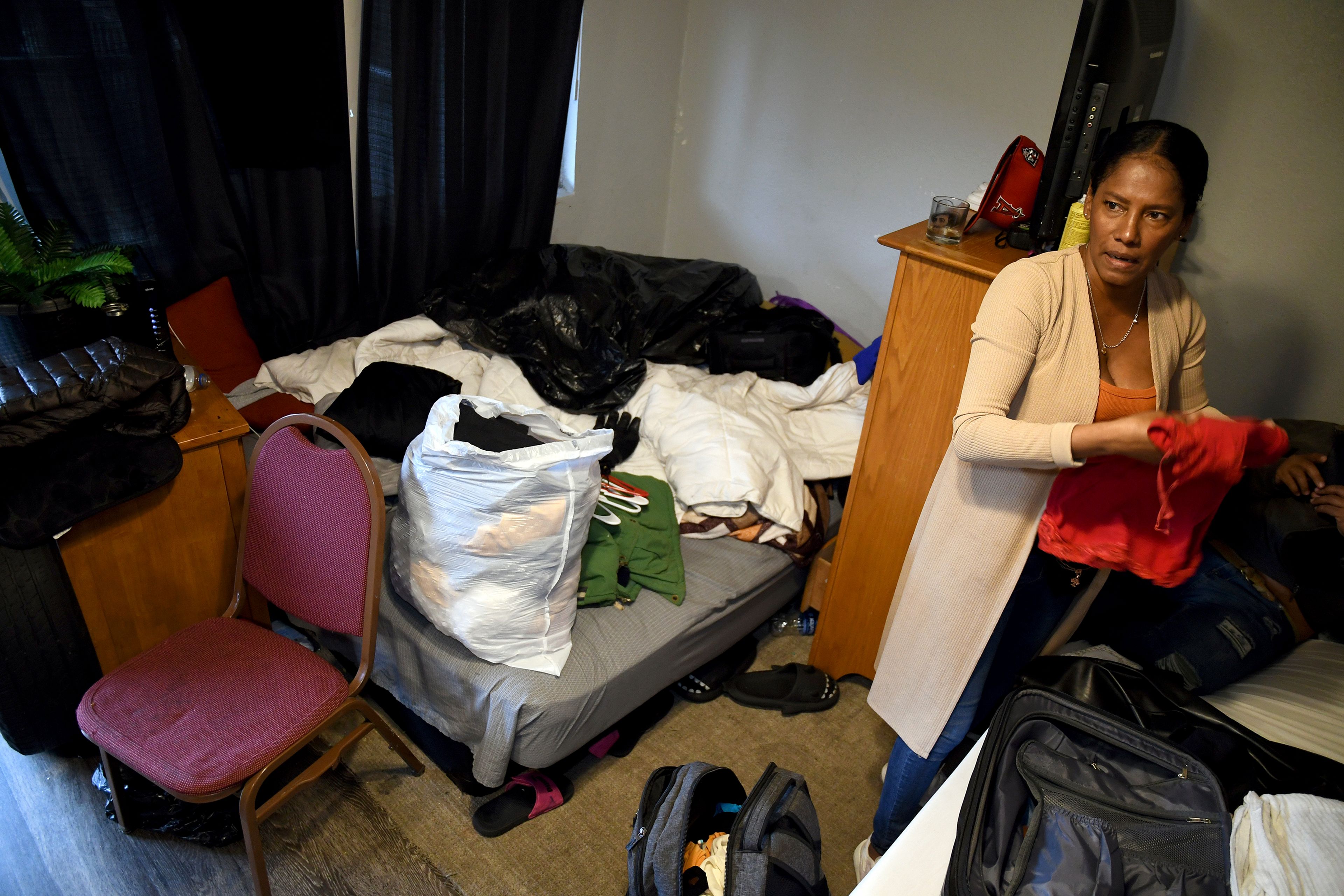 Sofia Roca packed her belongings as she prepared to leave Aurora, Colorado, on March 29, 2024. (AP Photo/Thomas Peipert)