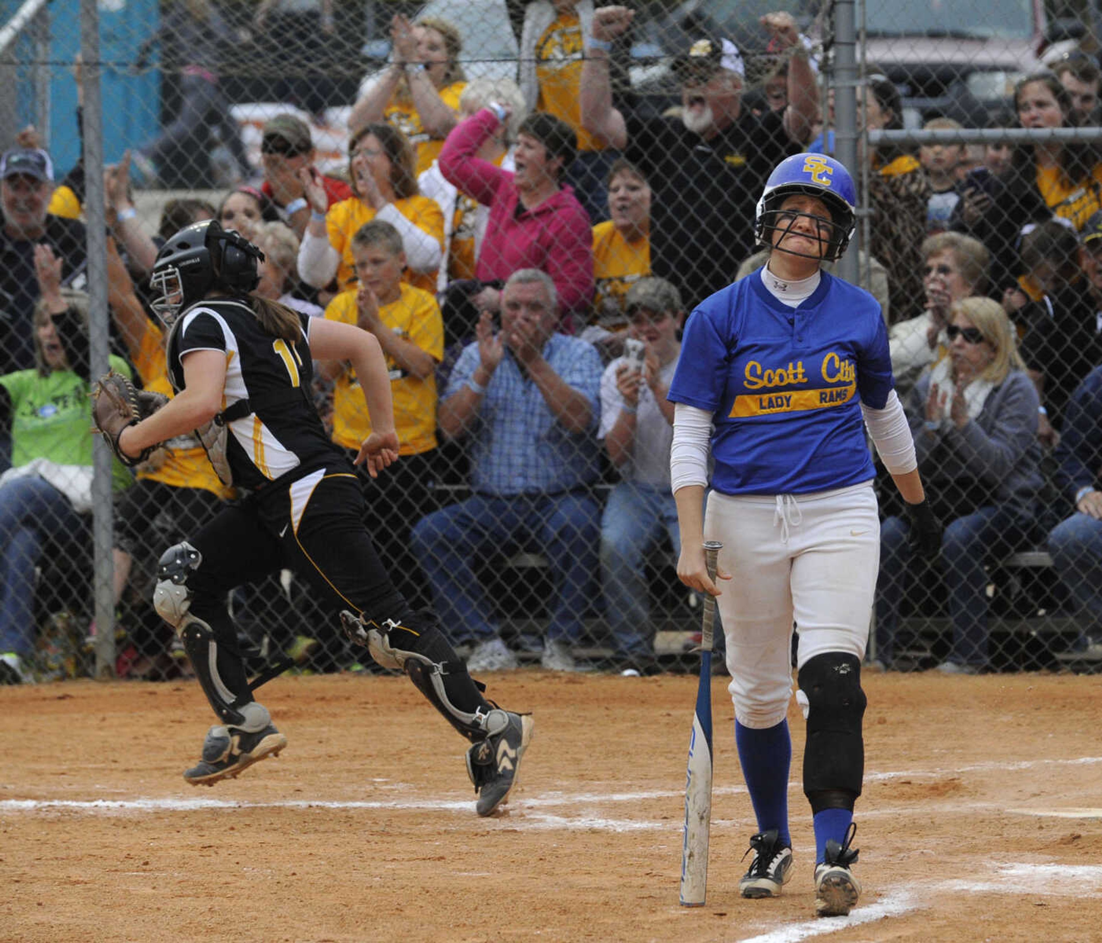 Scott City's Becky Burger reacts after striking out to end the Class 1 state semifinal softball game, which Kennett won 4-1, Friday, May 16, 2014 at Three Rivers Community College in Poplar Bluff, Mo. (Fred Lynch)