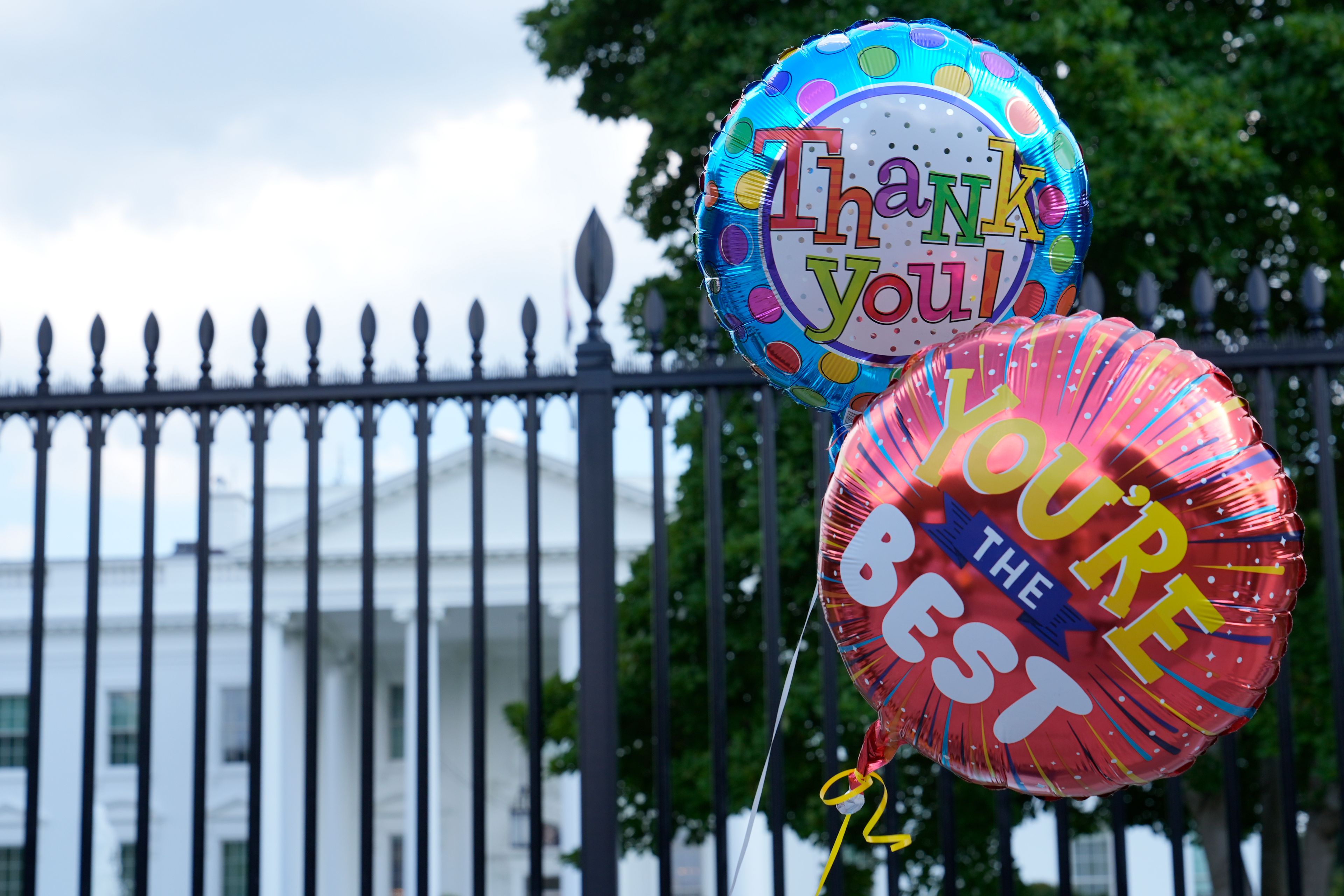 Balloons for President Joe Biden are brought to the White House in Washington, Sunday, July 21, 2024. Biden dropped out of the 2024 race for the White House on Sunday, ending his bid for reelection following a disastrous debate with Donald Trump that raised doubts about his fitness for office just four months before the election. (AP Photo/Susan Walsh)