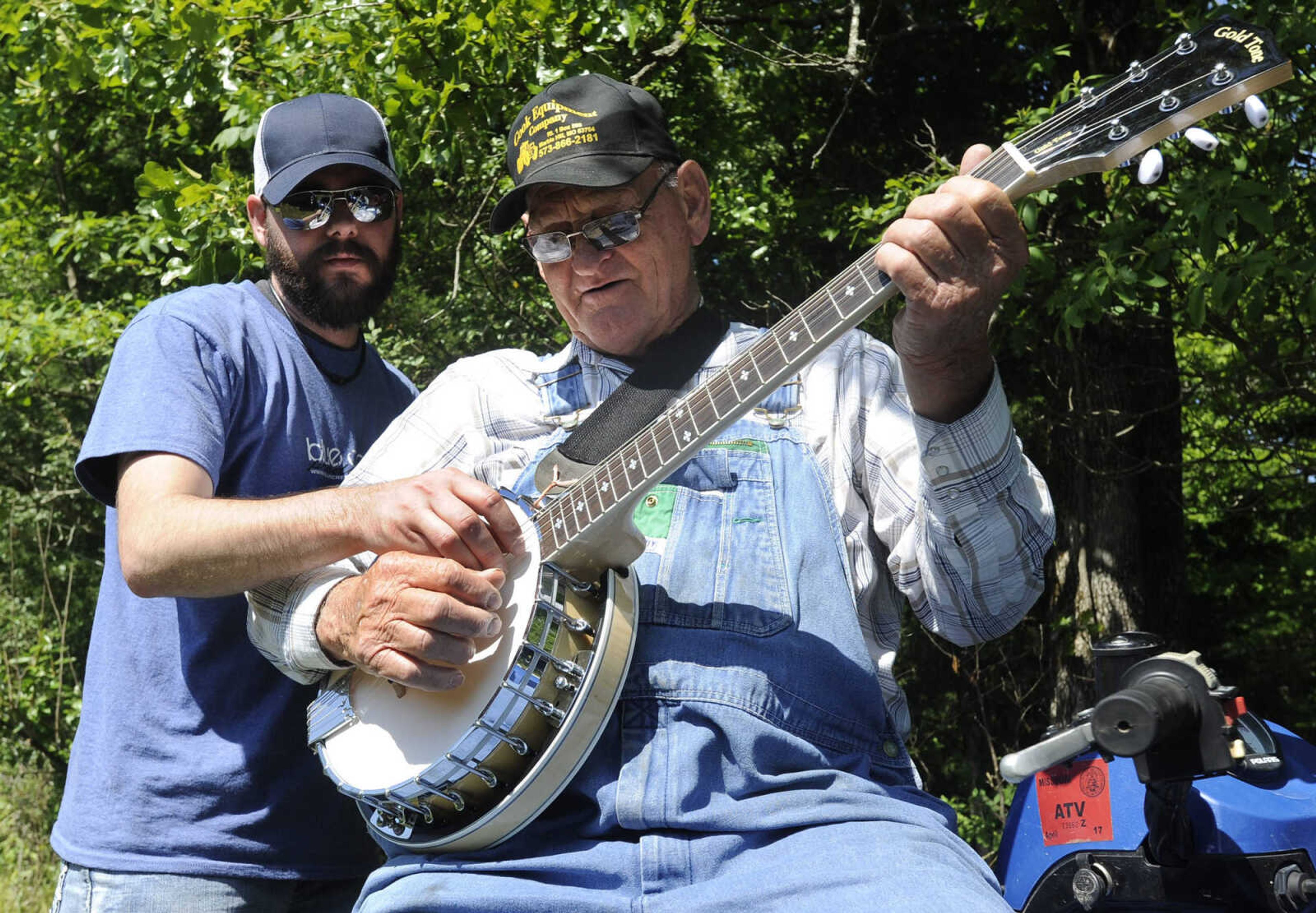 FRED LYNCH ~ flynch@semissourian.com
Dustin Bannister, owner of Blue Creek Production, prepares farmer Bill Fulton for his final scene in the video for The Hollerboys Sunday, May 22, 2016 near Patton, Missouri.