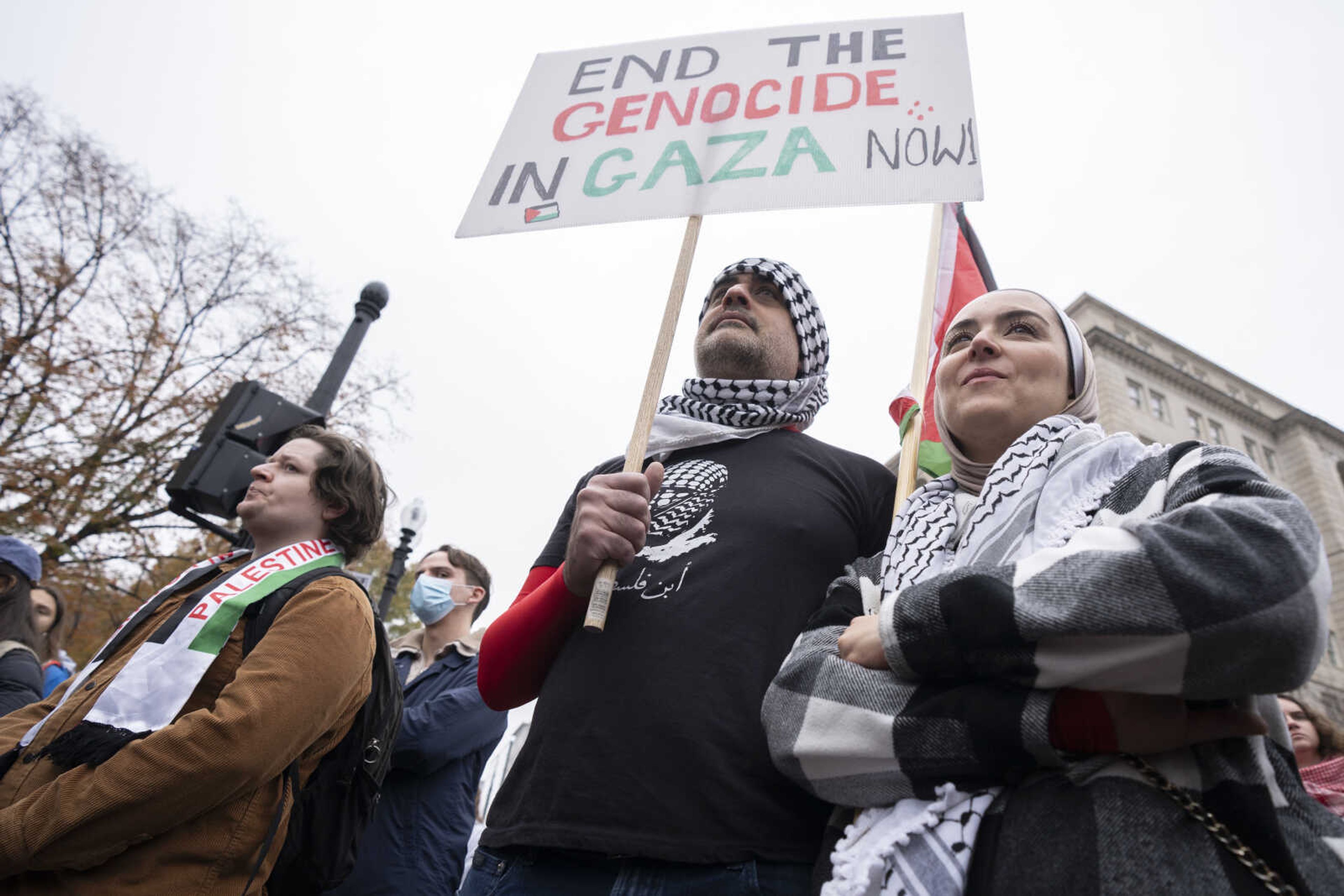 People gather in support of Palestinians Saturday near the White House in Washington.