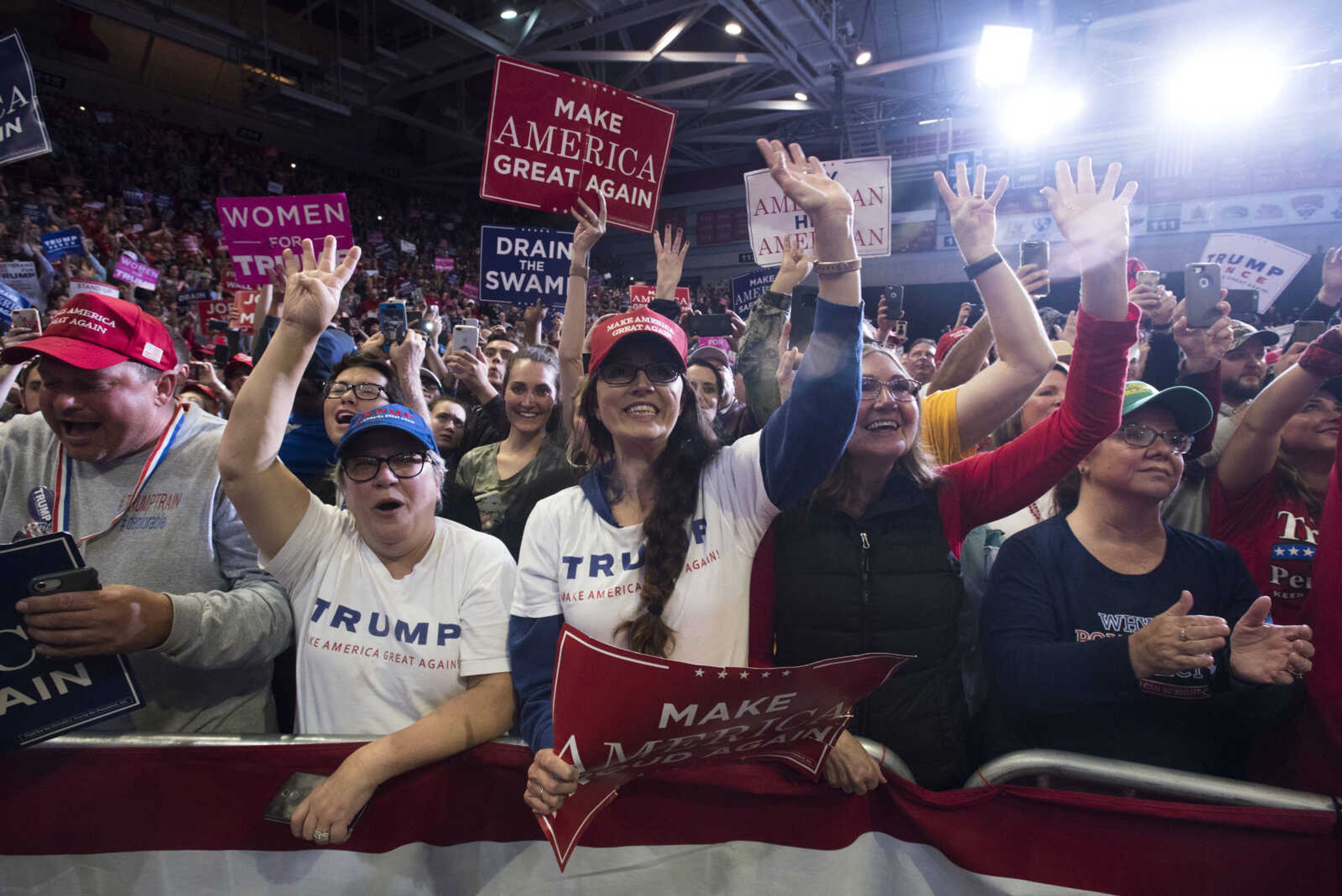 Trump supporters chant "Four more years!" as President Donald Trump takes the stage during a Make America Great Again rally Monday, Nov. 5, 2018, at the Show Me Center in Cape Girardeau.